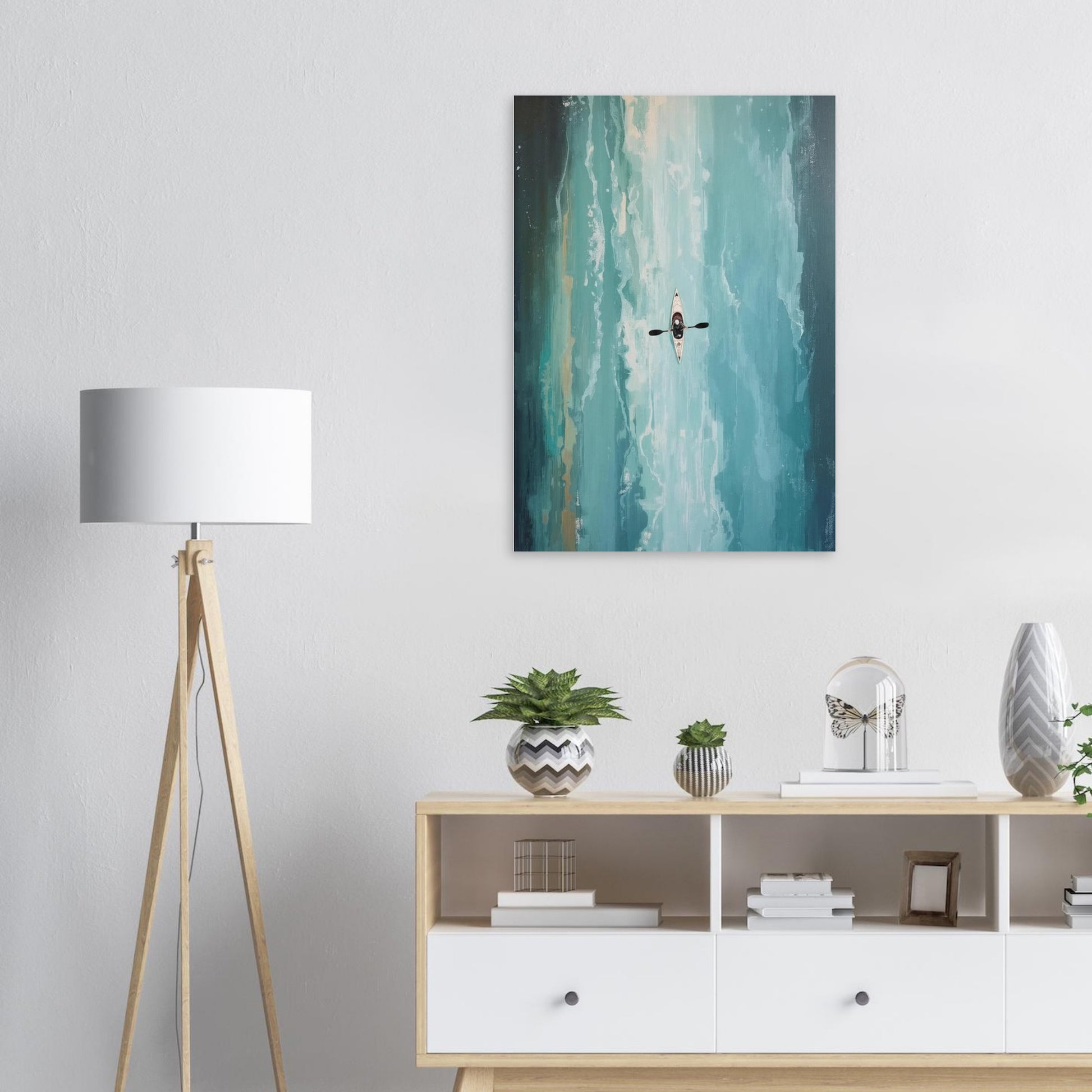Modern interior with a Turquoise ocean kayak wall art on the wall, floor lamp, and wooden cabinet.