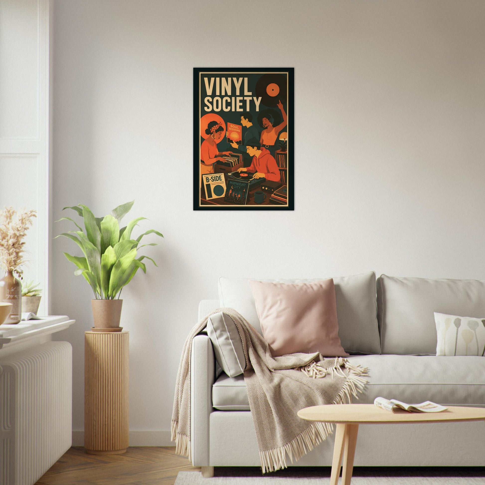 Framed Vinyl Society music poster displayed above a sofa in a contemporary black and white living room.