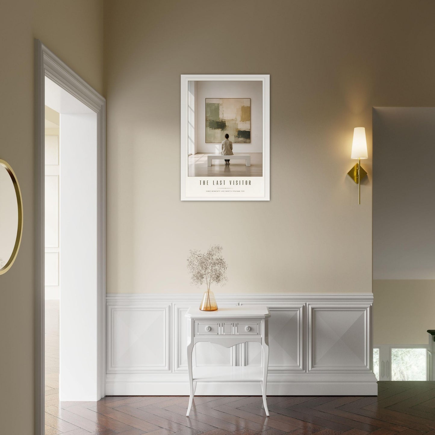 Framed artwork on a wall above a white console table in a room with a lamp and mirror.