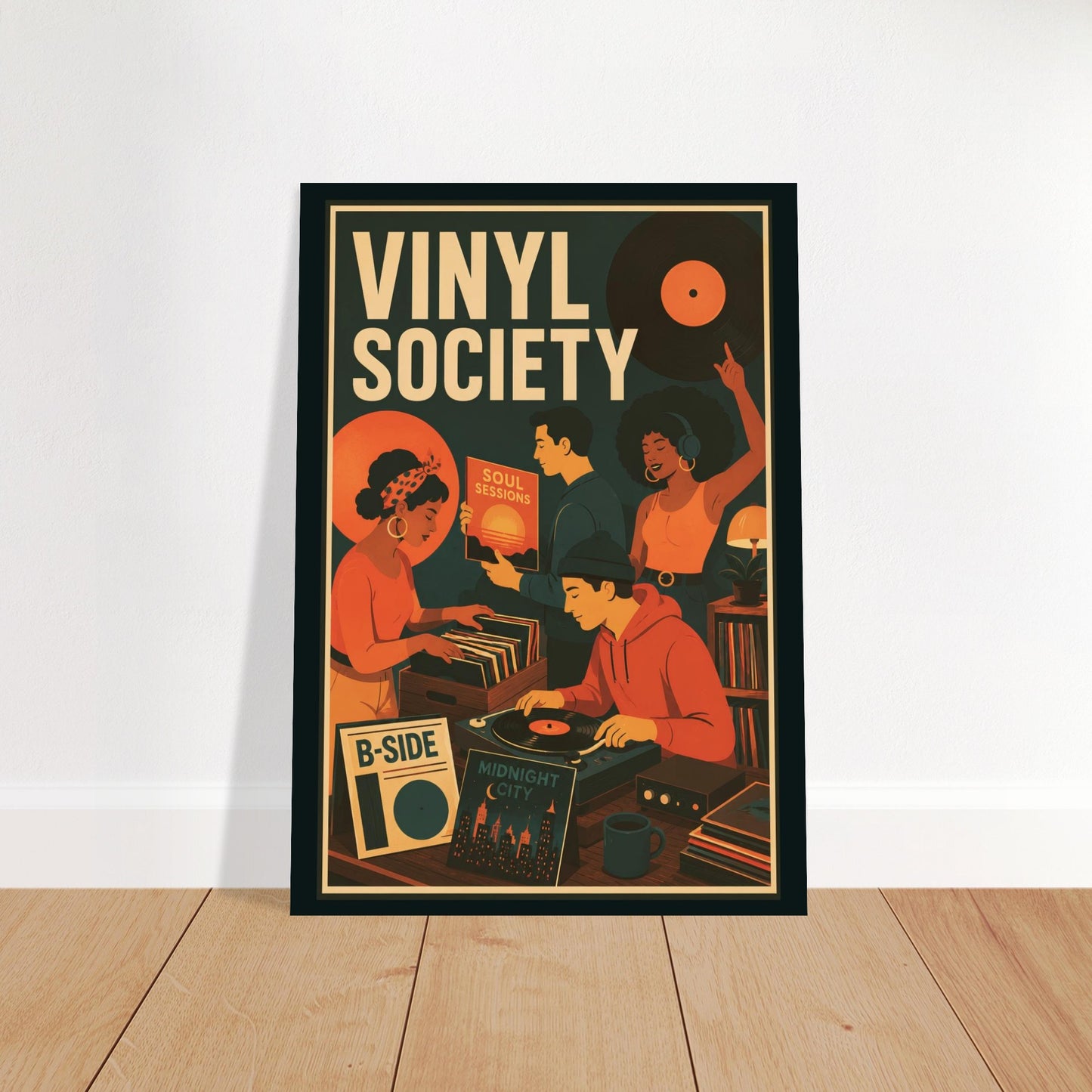 A framed retro-style poster leaning against a white wall on a light wood floor. The poster reads “VINYL SOCIETY” in large cream letters and shows illustrated people gathered around turntables with vinyl records, in warm orange, red, and cream tones against a dark background.