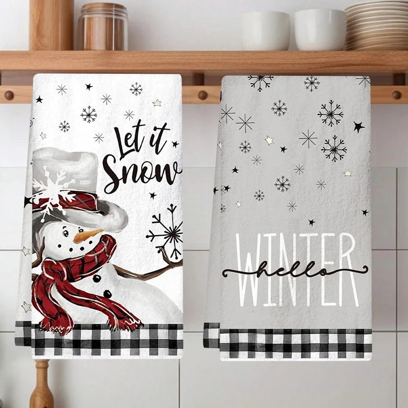 2-piece Christmas Tea towel set with snowman and snowflake designs in festive grey and white tones