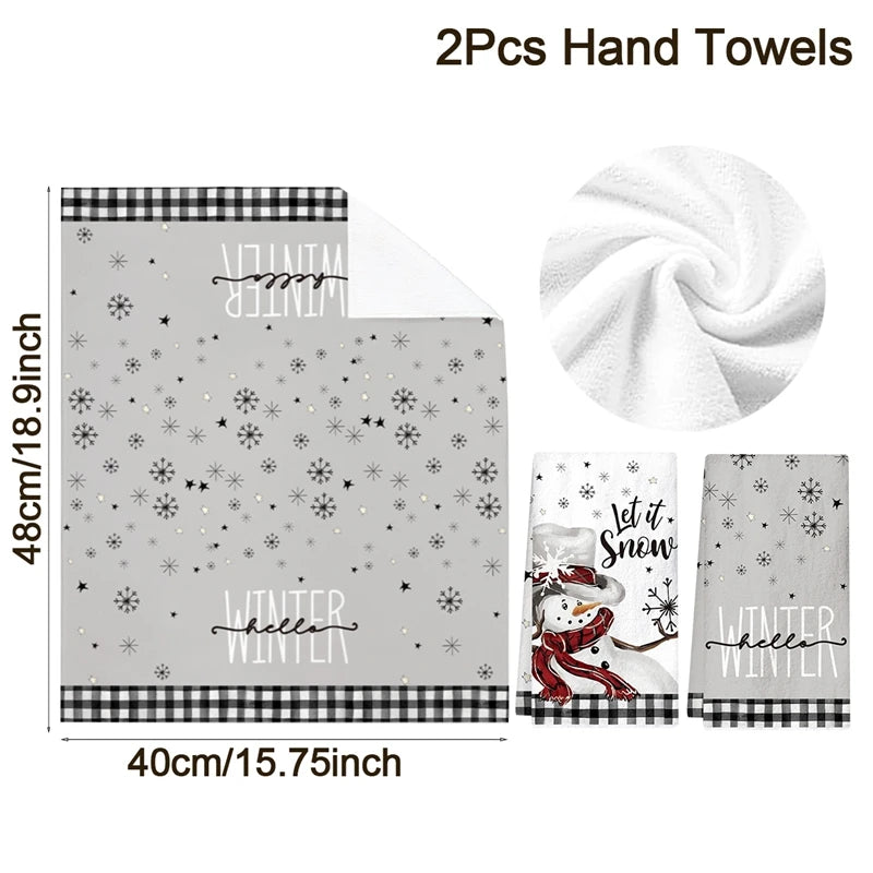 Set of two hand towels with winter-themed designs and measurements on a white background.