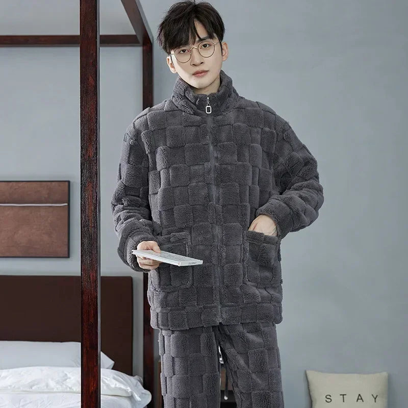 Person wearing a textured gray pajama set in a bedroom setting.