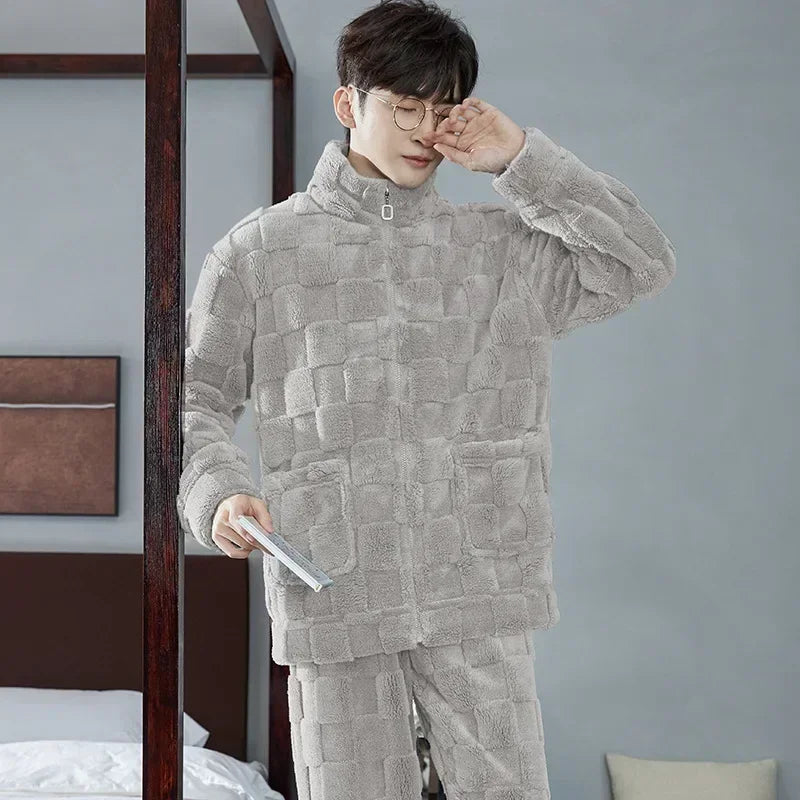 Person wearing a textured gray pajama set in a bedroom setting.