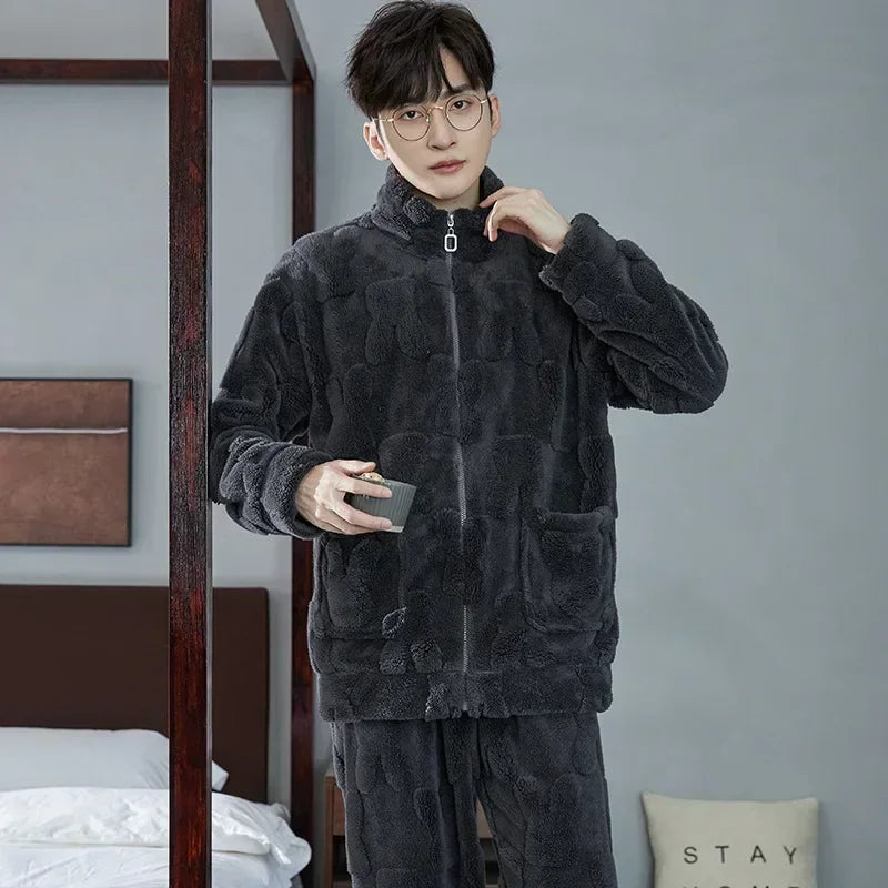 Person wearing a dark gray fleece outfit in a bedroom setting