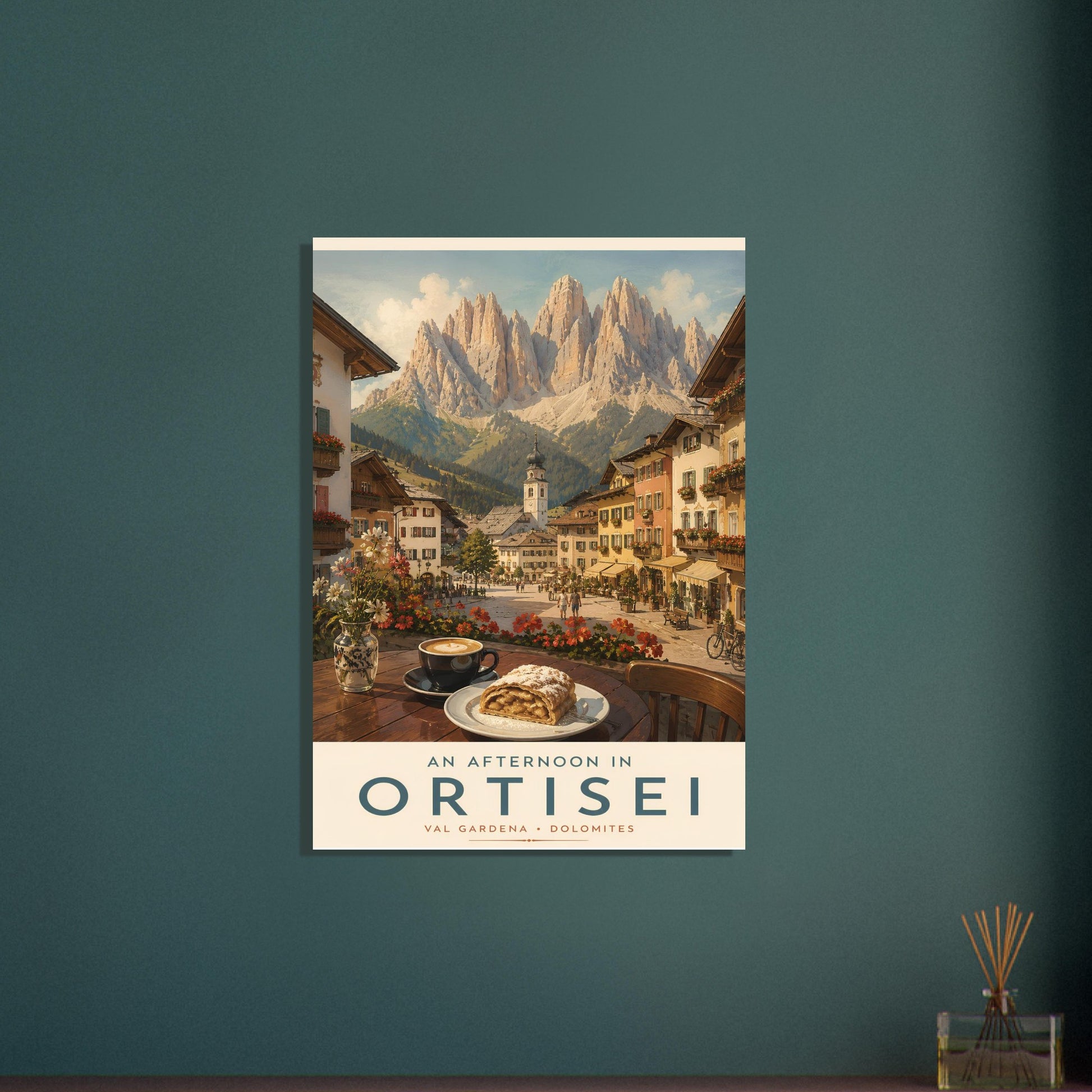 Ortisei travel poster mounted against a deep green wall, featuring a charming Italian alpine village beneath the majestic Dolomite peaks.