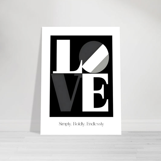 Unframed black and white LOVE typography poster with modern design, styled upright on a light wooden floor against a white wall