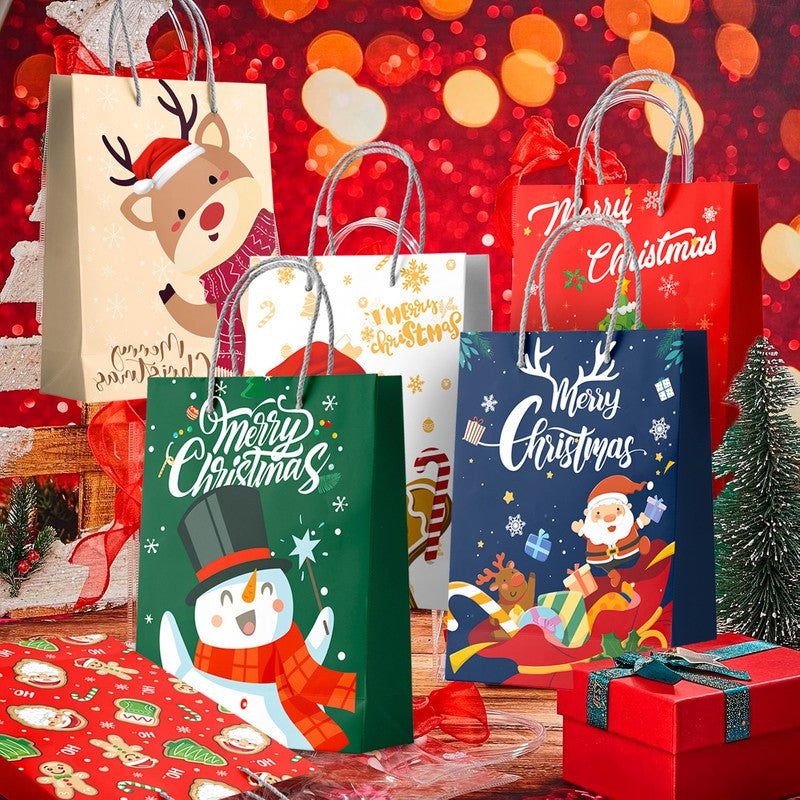 24 Christmas paper gift bags with handles featuring Santa, Reindeer, Snowman, and Gingerbread designs