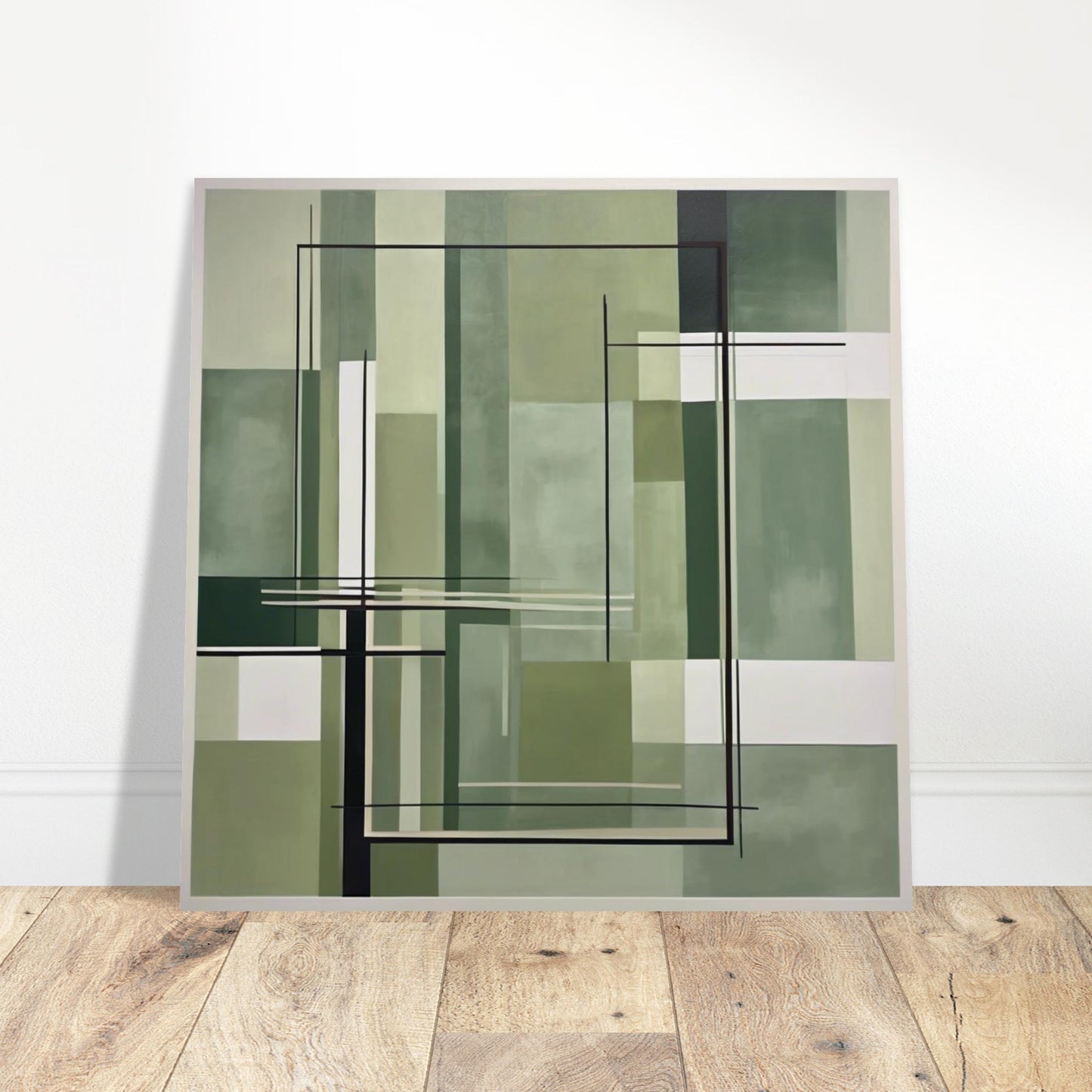 Sage green abstract geometric poster print leaning against a white wall in a modern interior