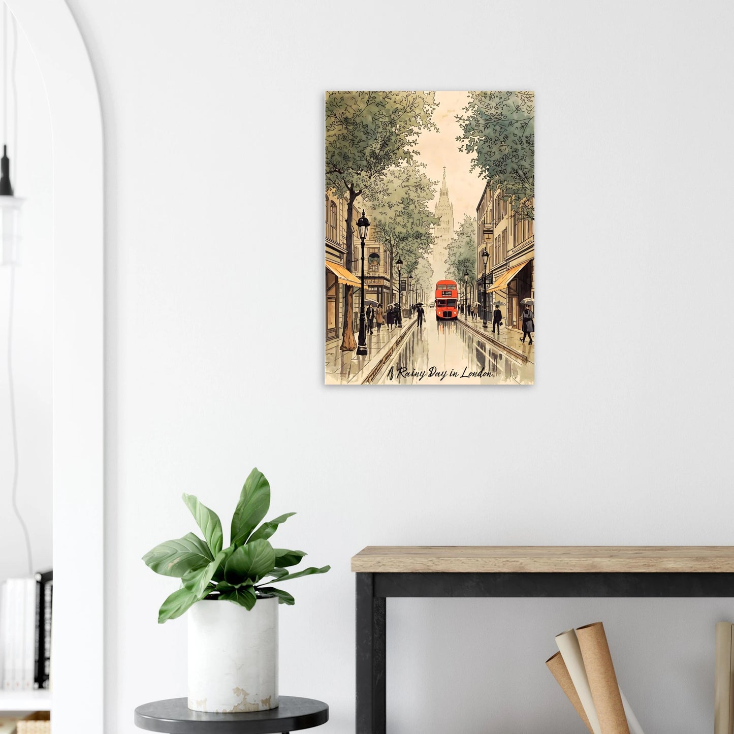 Canvas print of a London street scene with a red double-decker bus, hanging on a white wall above a desk.