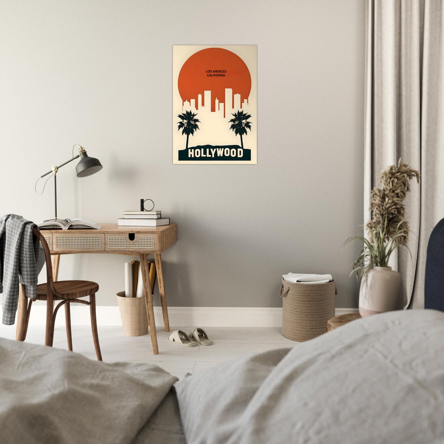 Room interior with a desk, lamp, and 'Hollywood' wall art on a gray wall.