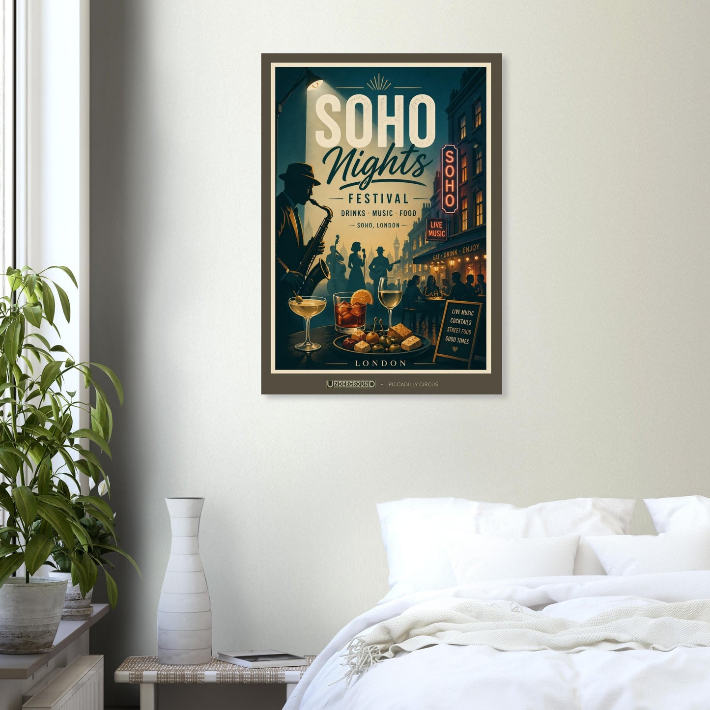 Framed poster of 'Soho Nights' festival on a wall above a bed.