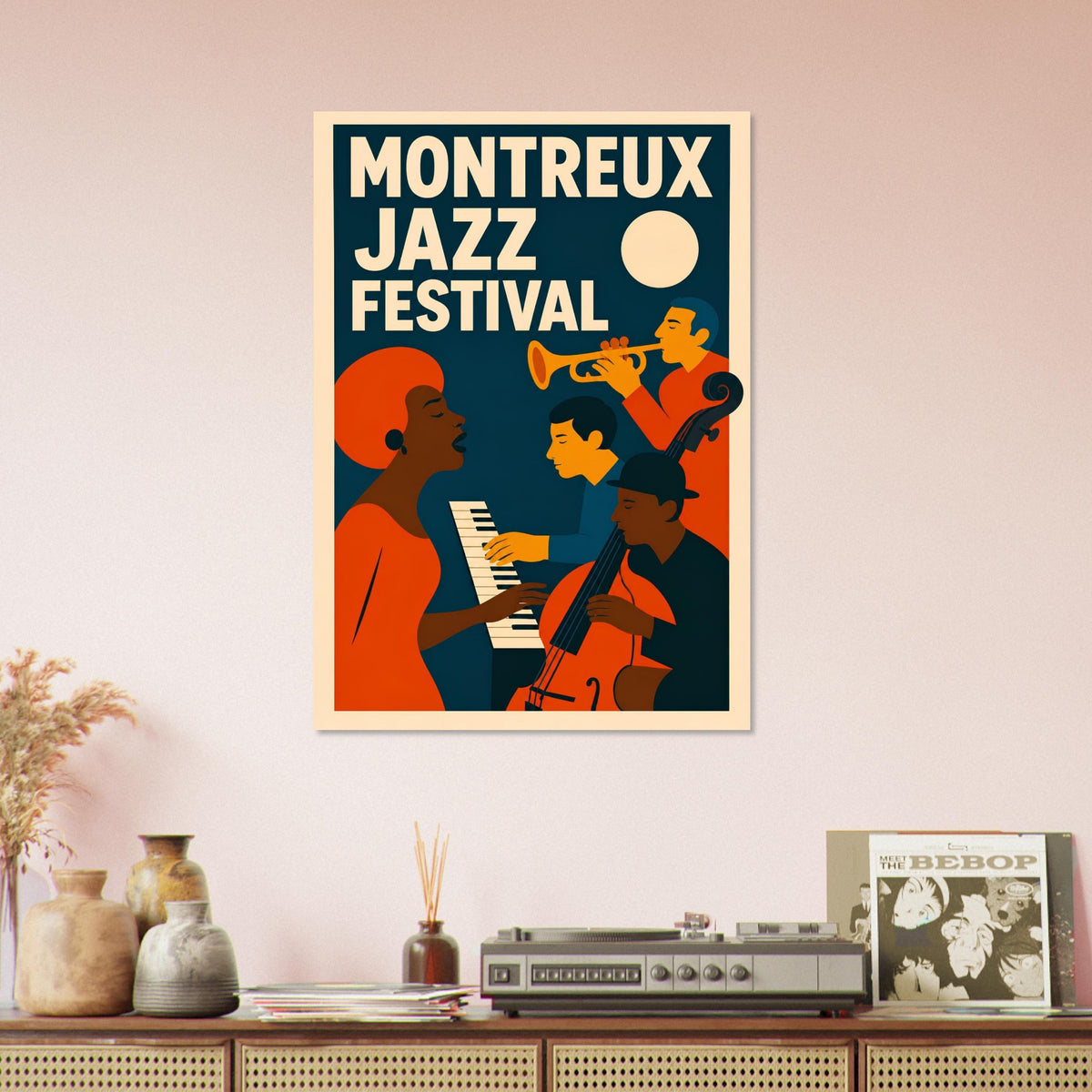 A framed Montreux Jazz Festival poster with a retro illustration of jazz musicians hangs on a light pink wall above a wooden console table with decorative vases, a record player, and a magazine.