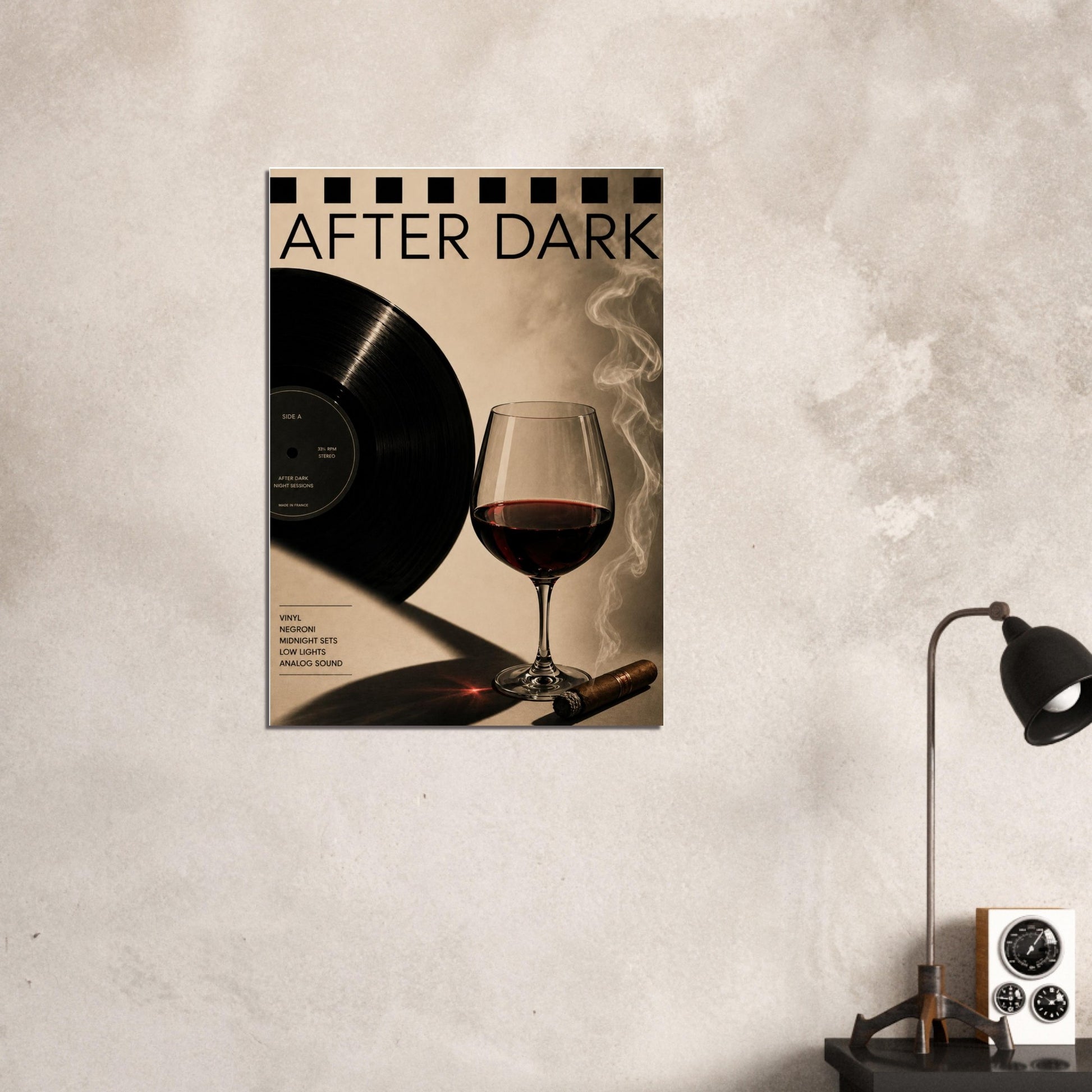 Poster with 'After Dark' text, vinyl record, and wine glass on a textured wall with a lamp and clock.