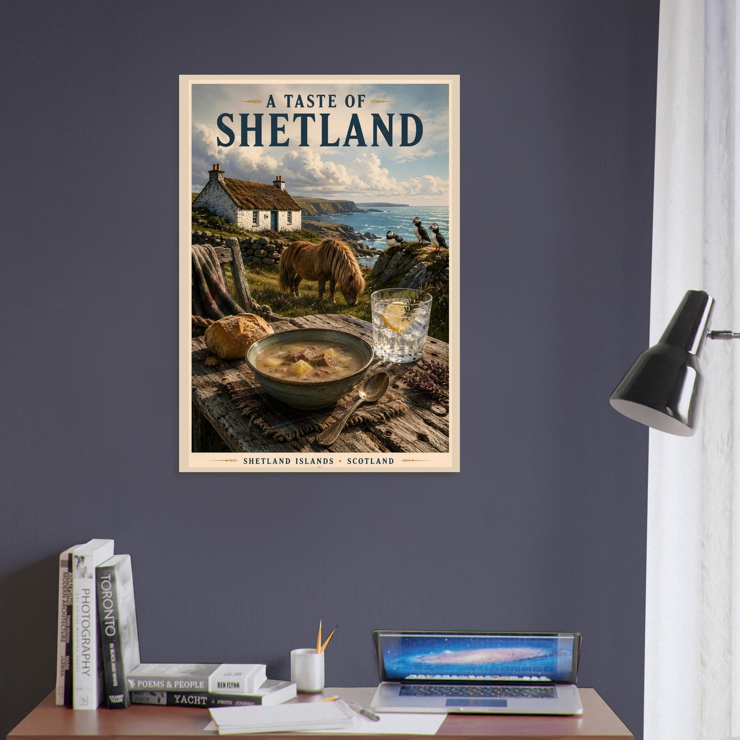 Shetland travel poster framed above a desk and books in a cosy reading nook with blue walls