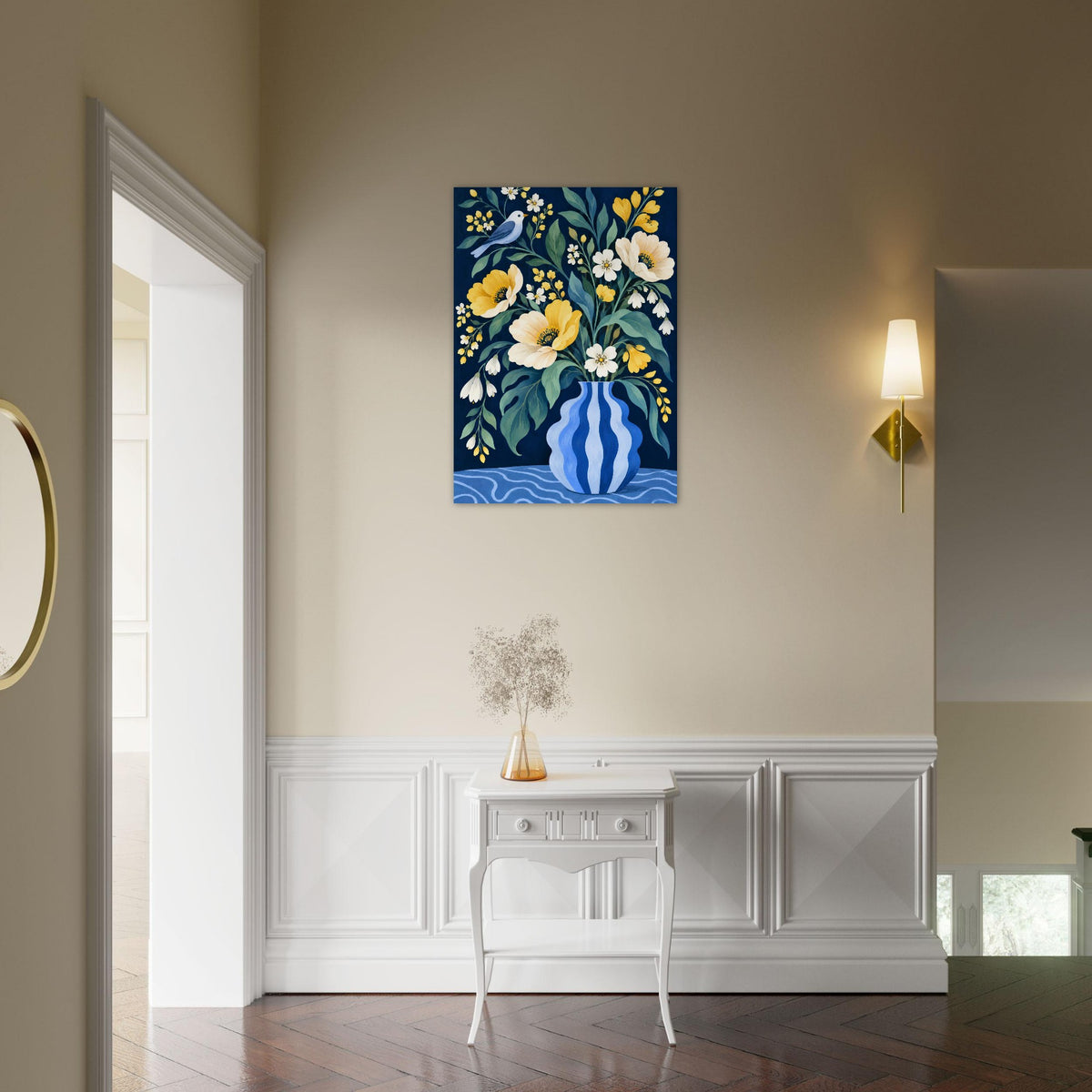 A colorful floral wall art print depicting a blue striped vase with yellow, white, and red flowers, displayed in a modern hallway above a white side table.