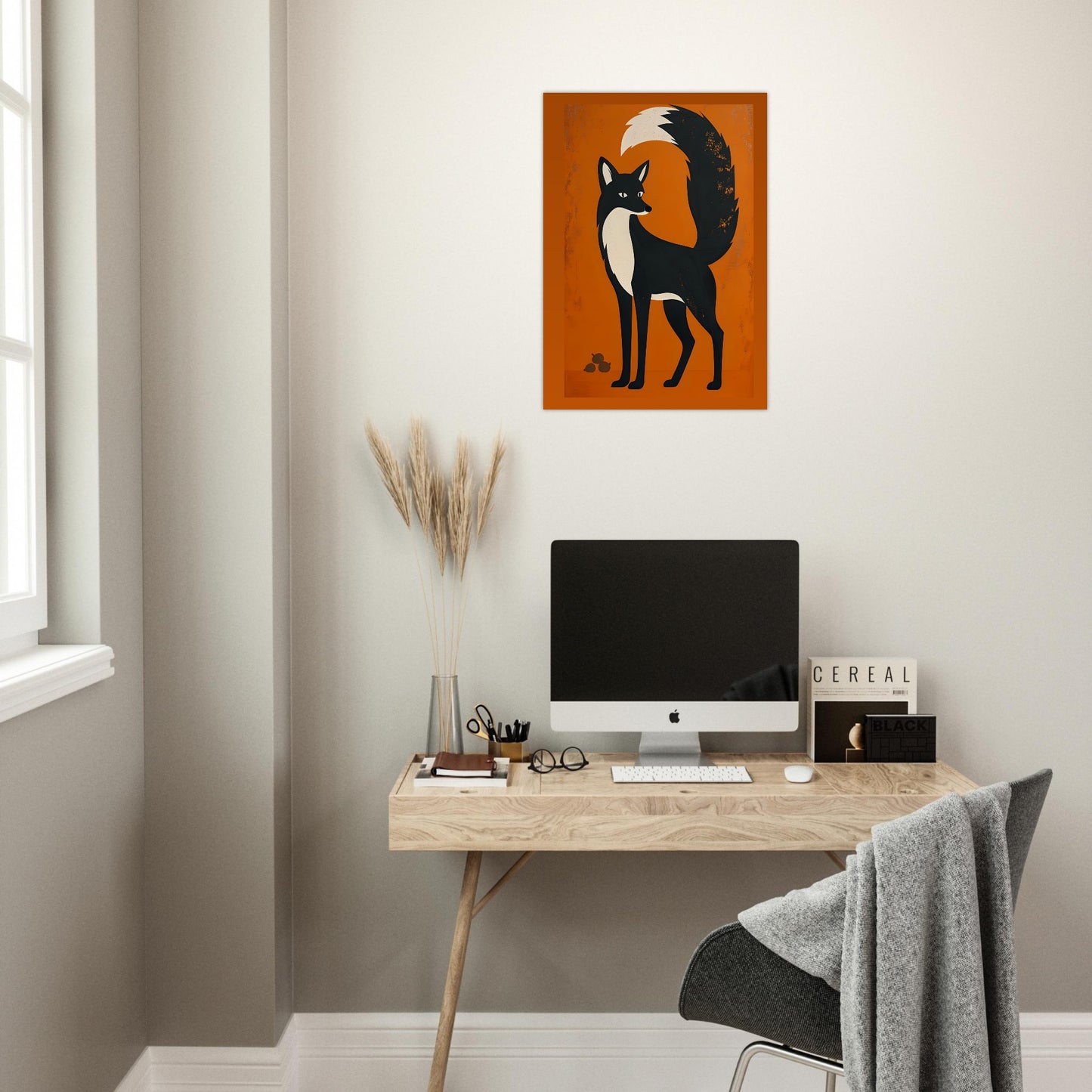 Modern home office with a desk, computer, and wall art of a fox.