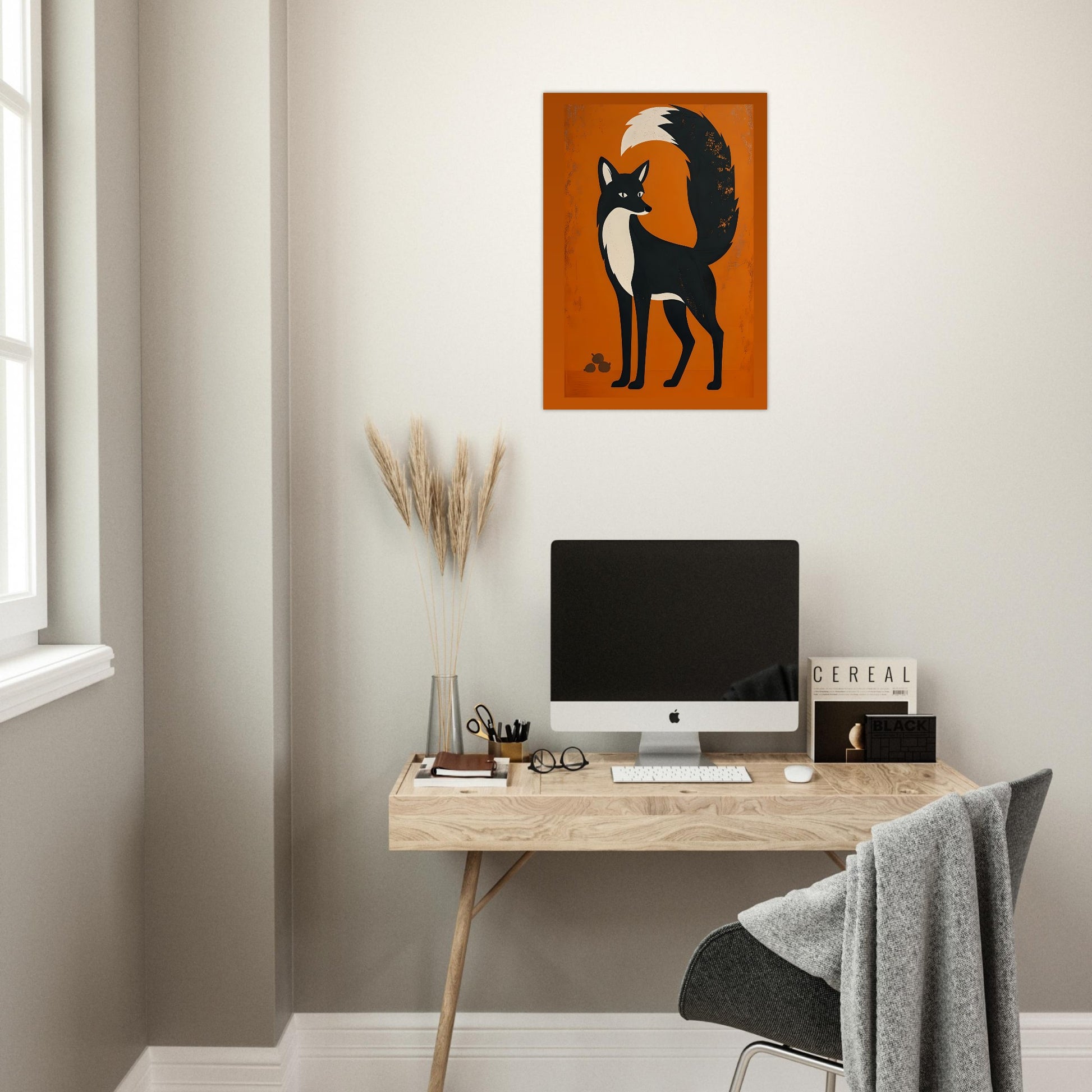 Modern home office with a desk, computer, and wall art of a fox.