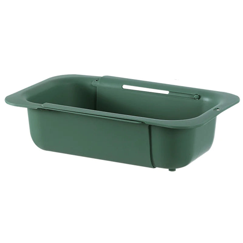 Green plastic tray with a handle on a white background