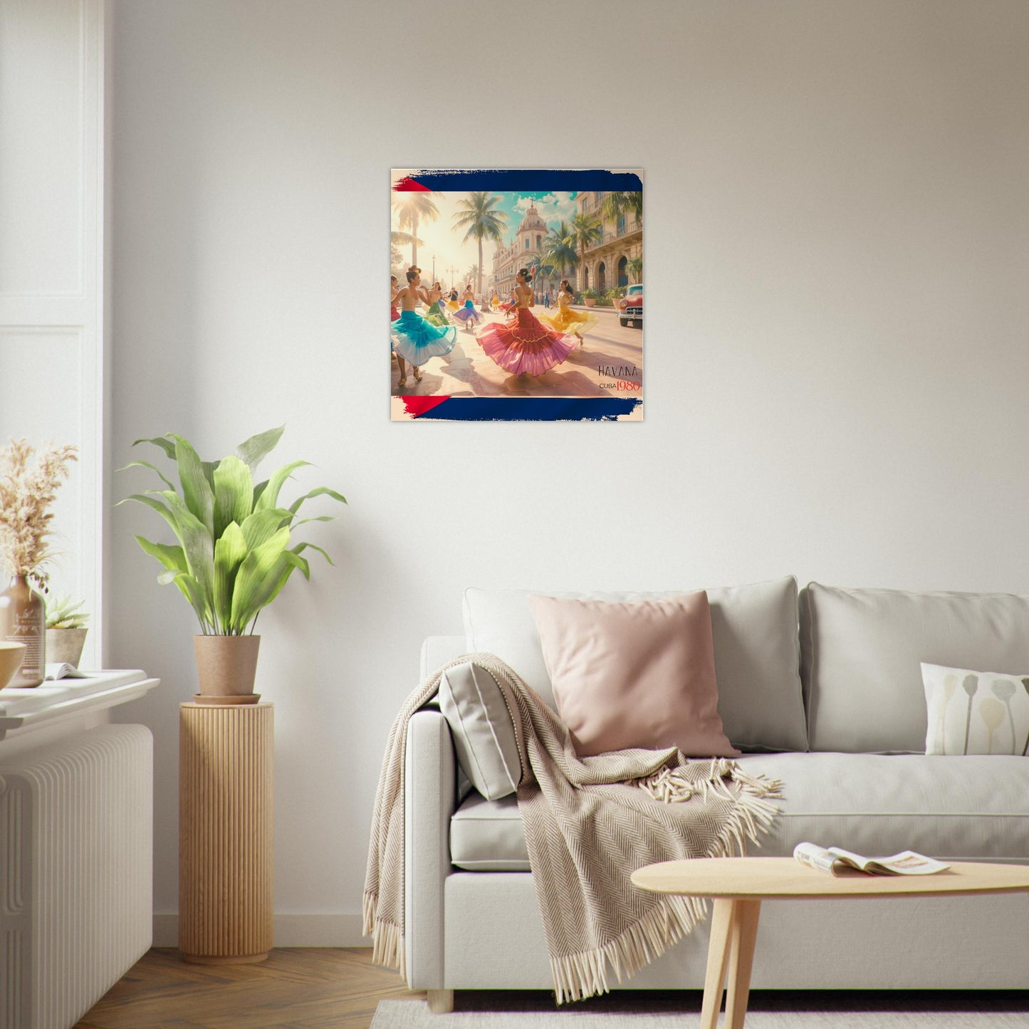 Living room with a painting of a woman in a pink dress on the wall, a couch with pillows, and a plant.