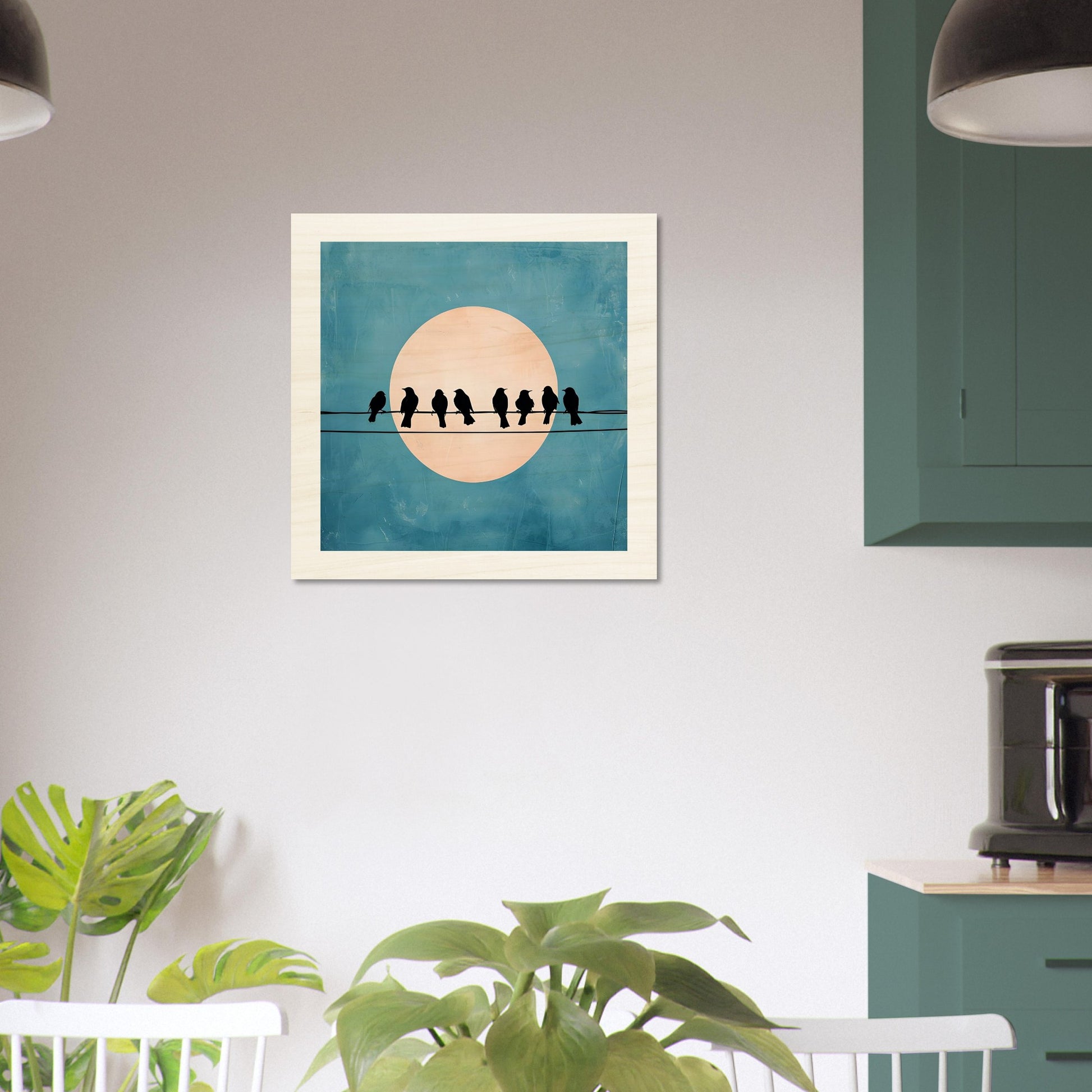 Wooden artwork of birds on a wire with a moon in the background