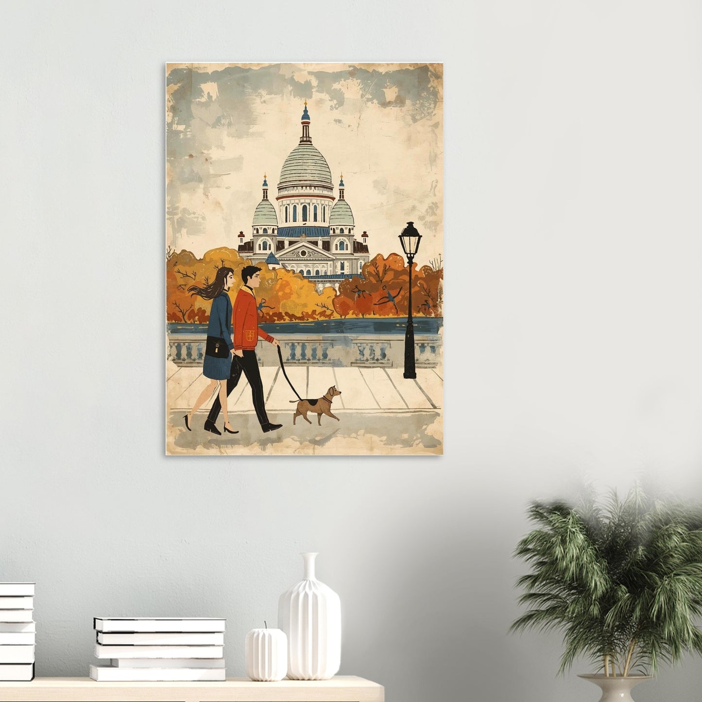 Poster of a couple walking a dog in an autumn setting with a cathedral in the background, displayed on a wall.