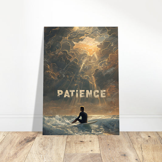 Surfer riding ocean waves at sunrise with the word â€œPatienceâ€ centered on the print, styled in a modern interior with warm beach tones.