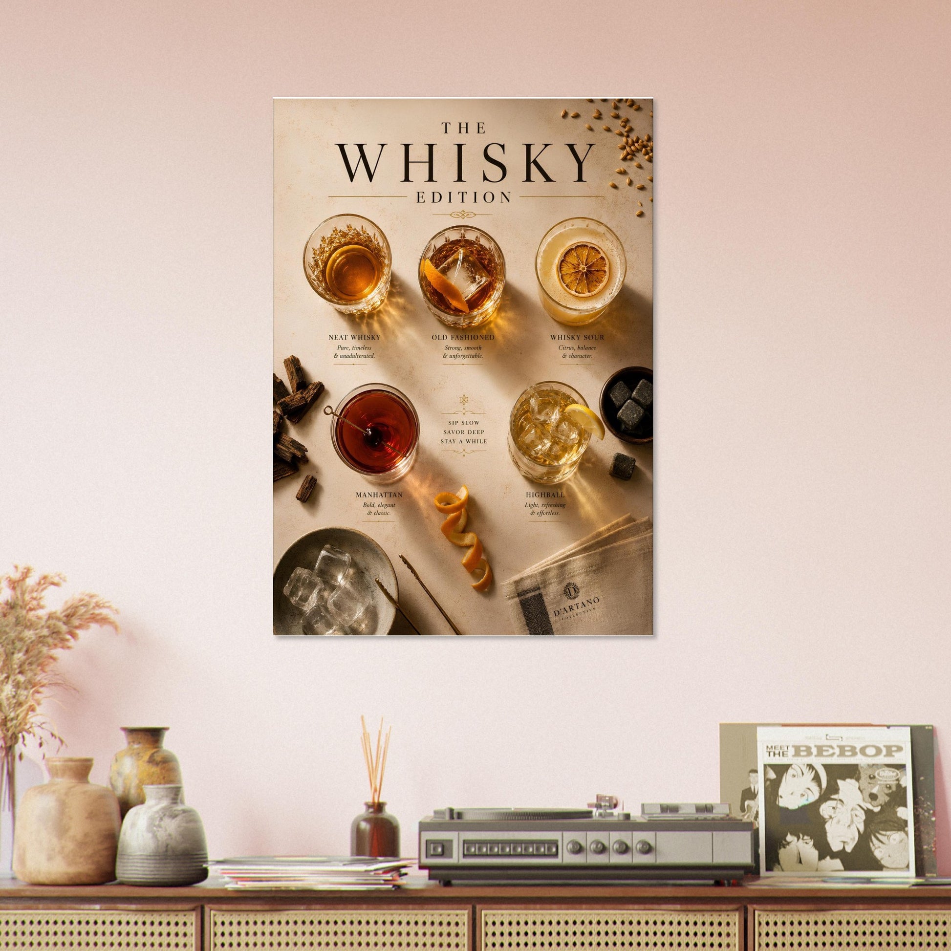 Poster titled 'The Whisky Edition' on a wall above a wooden shelf with decorative items.