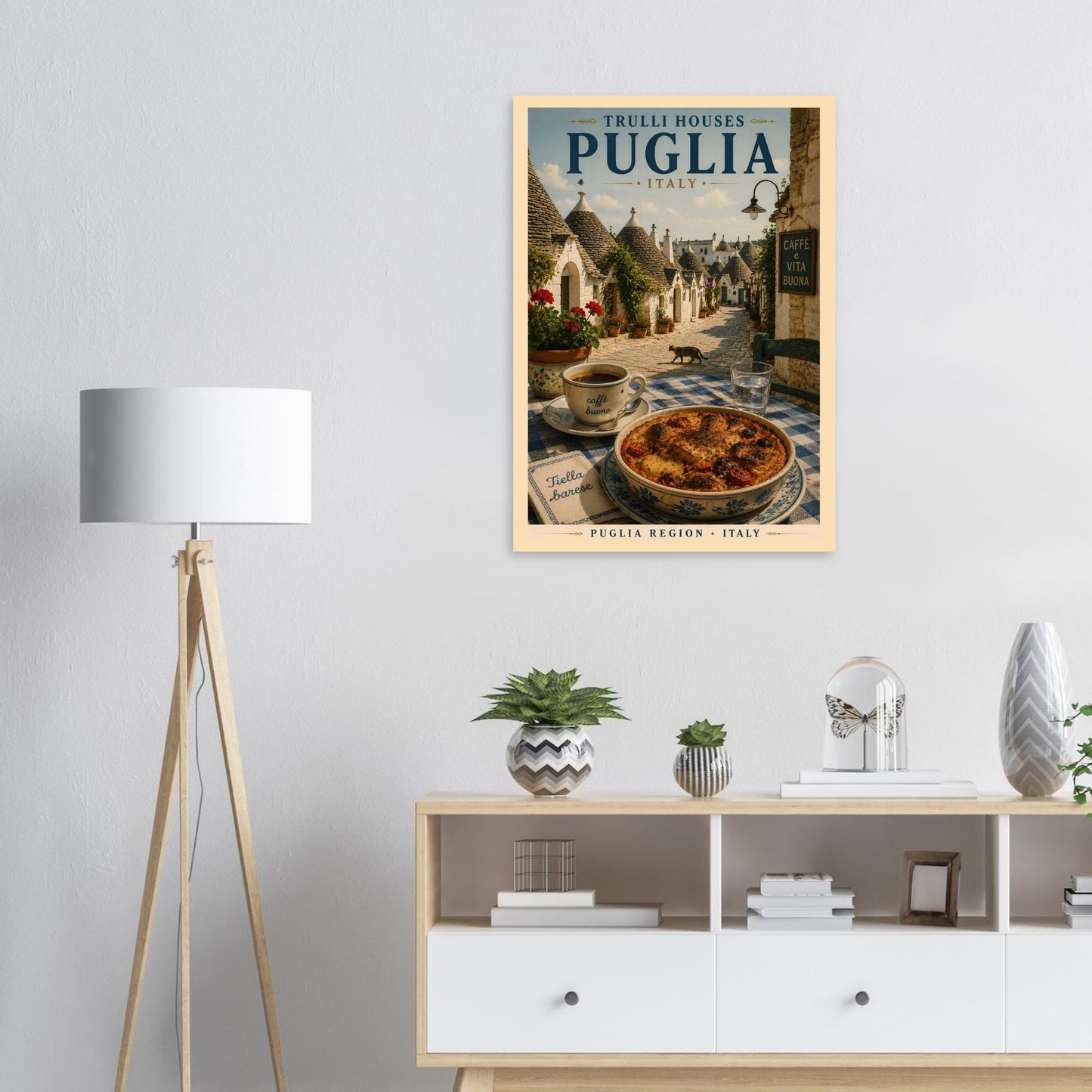 Puglia travel poster hanging above a sideboard in a contemporary living room