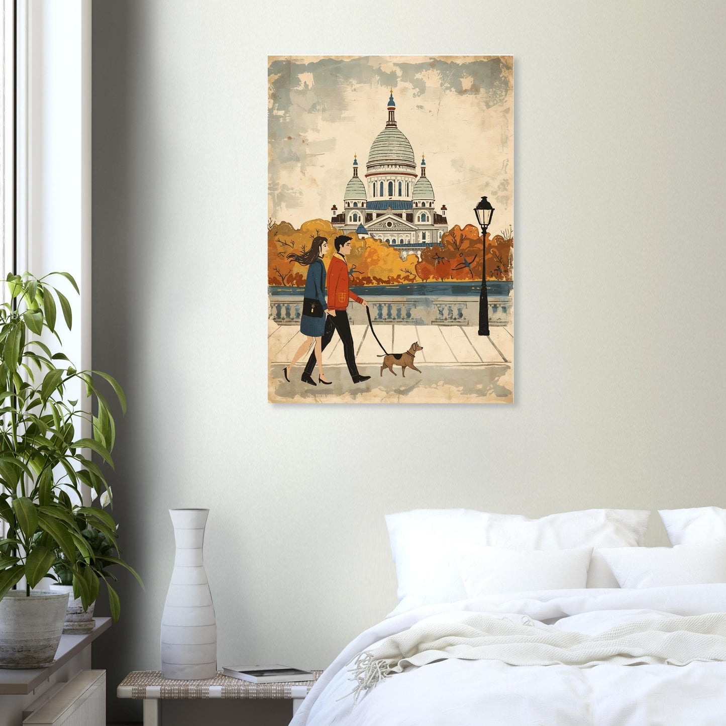 Framed artwork of a couple walking a dog in an urban setting, hanging on a wall above a bed.