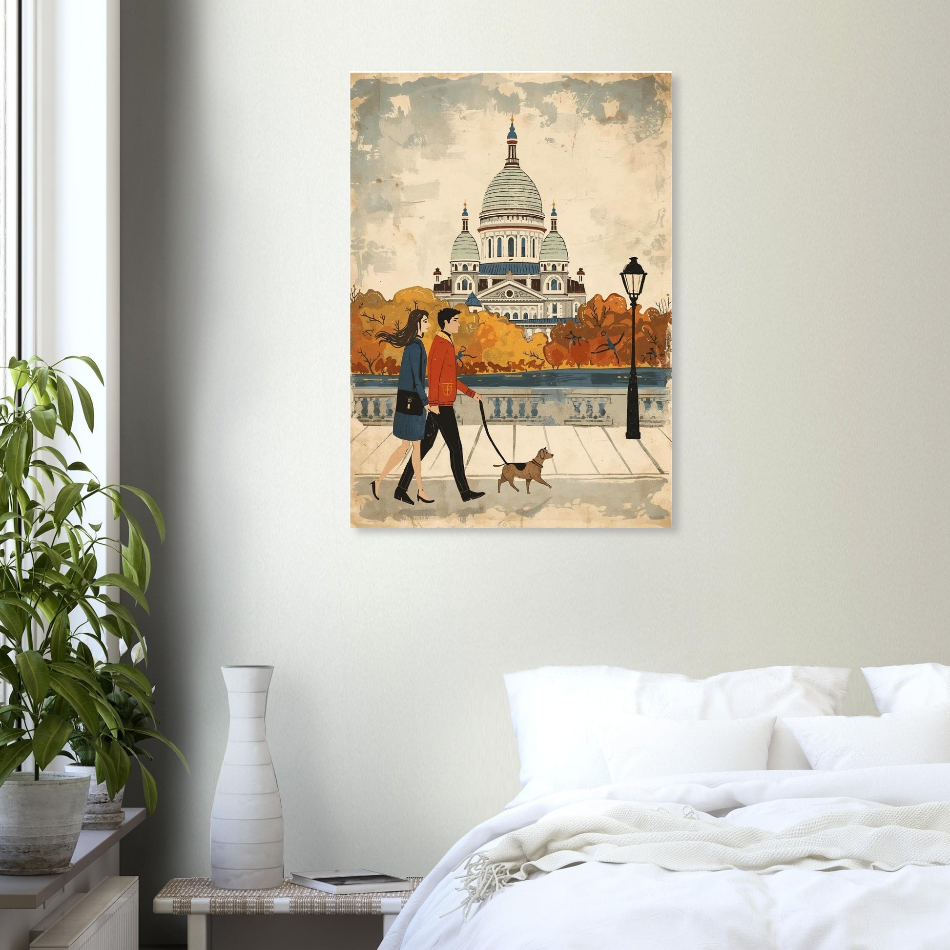 Framed artwork of a couple walking a dog in an urban setting, hanging on a wall above a bed.