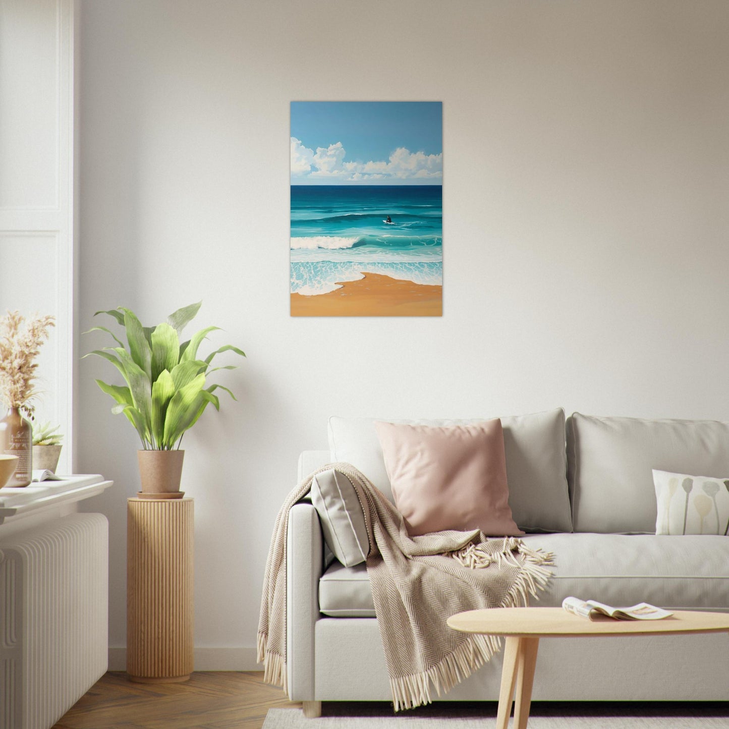Living room with a beach scene painting on the wall, sofa, and decorative items.