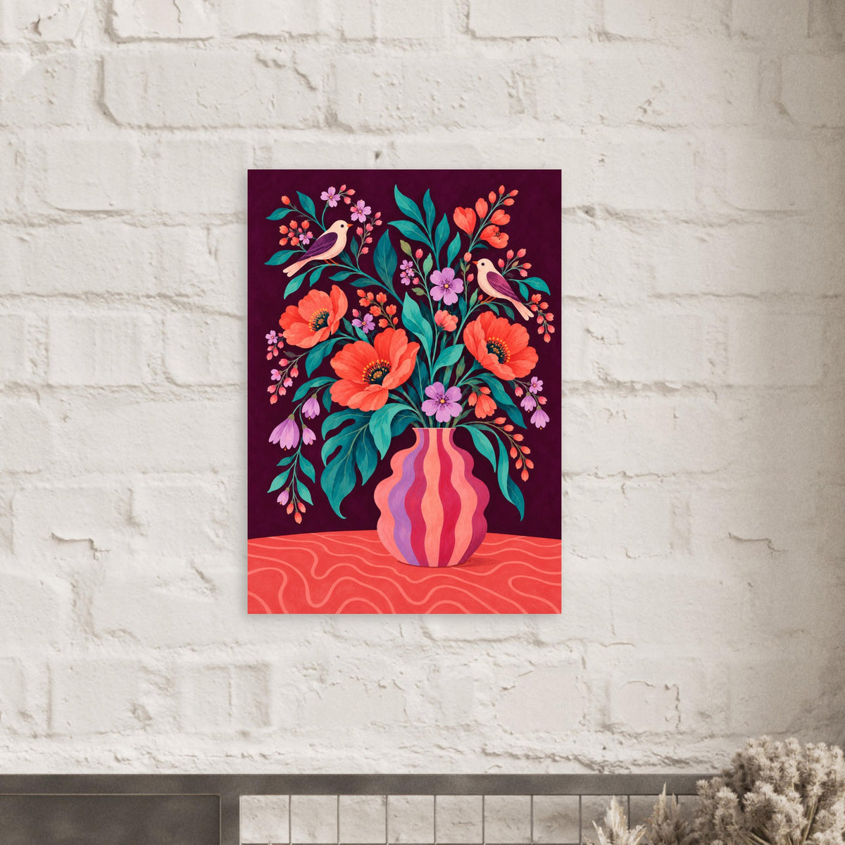 A vertical art print featuring a vibrant floral bouquet in a striped vase with two small birds, displayed on a white brick wall.
