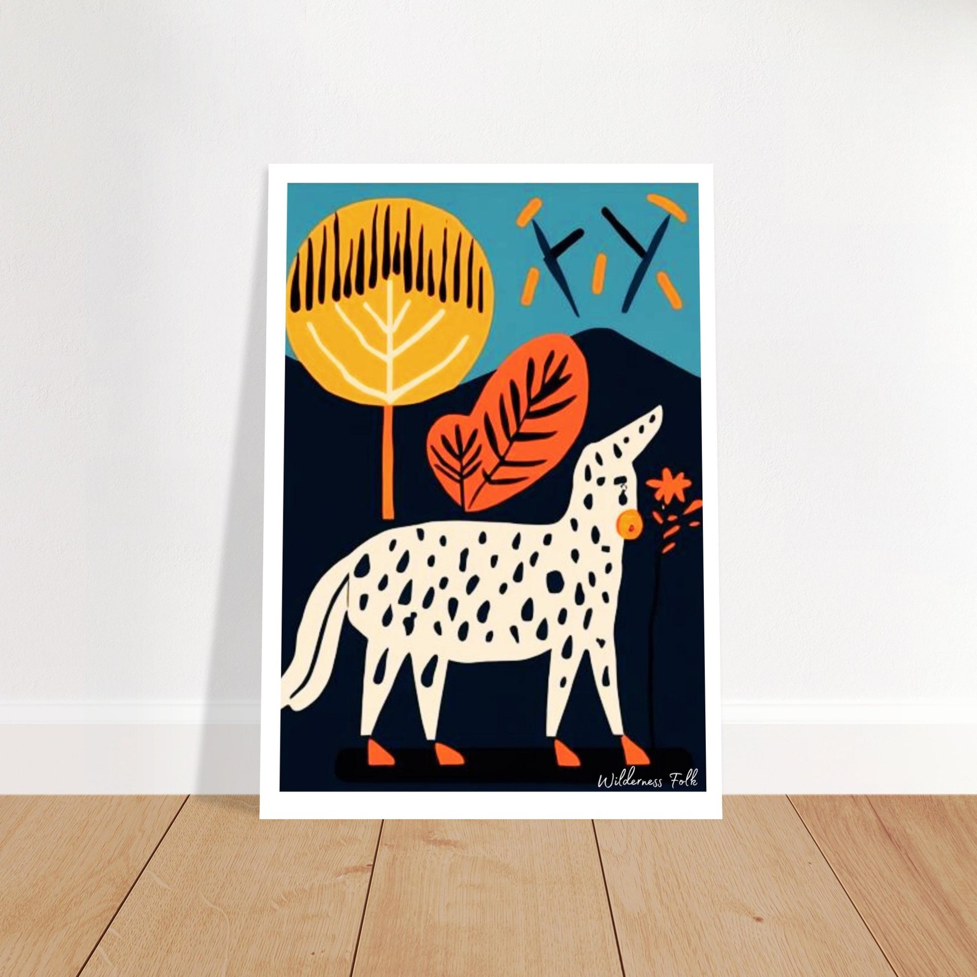 Colorful abstract art print of a spotted animal with leaves on a white wall.