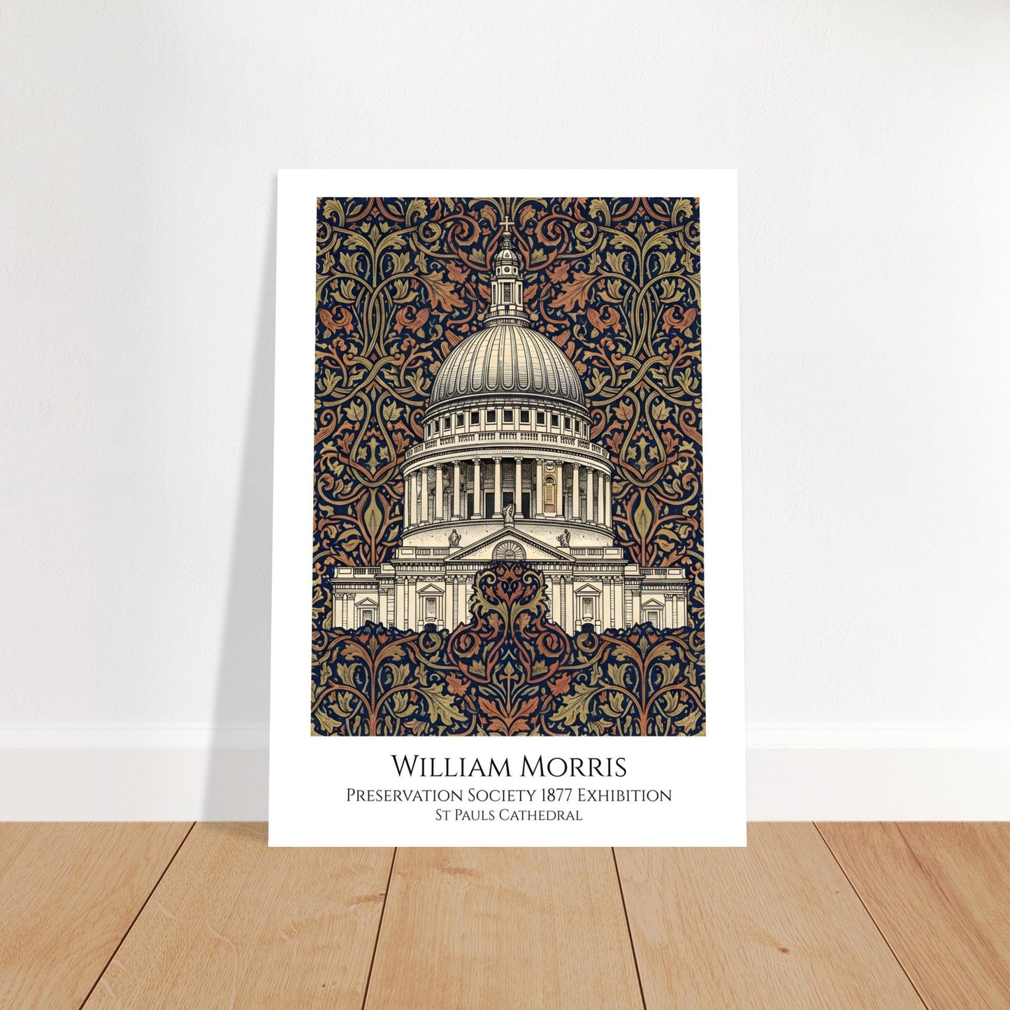 A vintage-style exhibition poster of St. Paul's Cathedral, London. The central architectural dome is framed by an intricate William Morris-style floral pattern in cream and charcoal. The bottom features a white border with elegant serif text reading 'William Morris Preservation Society 1877 Exhibition