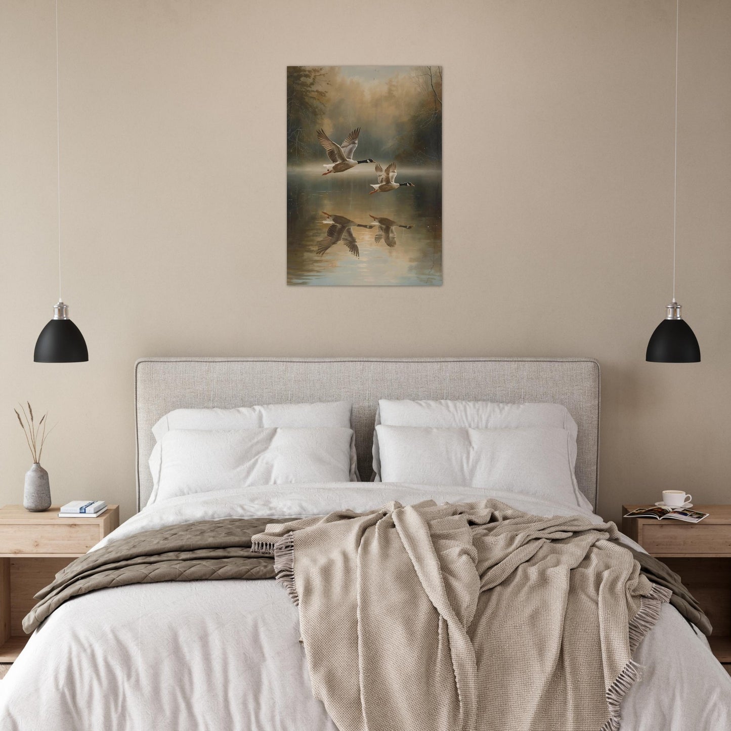 Bedroom with a bed, nightstands, and a wall painting of birds over water.