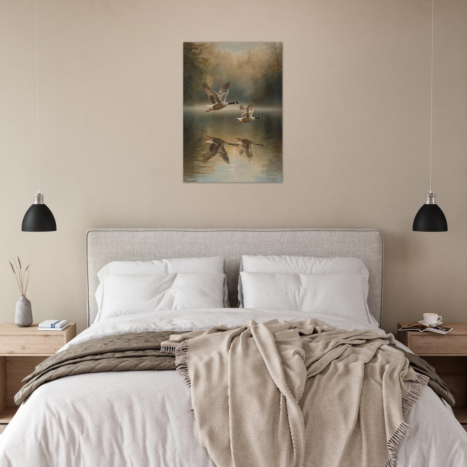 Bedroom with a bed, nightstands, and a wall painting of birds over water.