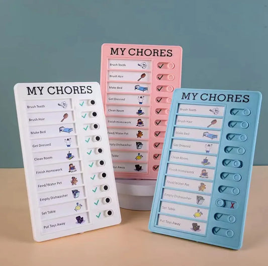 Reusable chore trackers for kids in pink, blue, and white, each displaying daily tasks with toggle switches for tracking