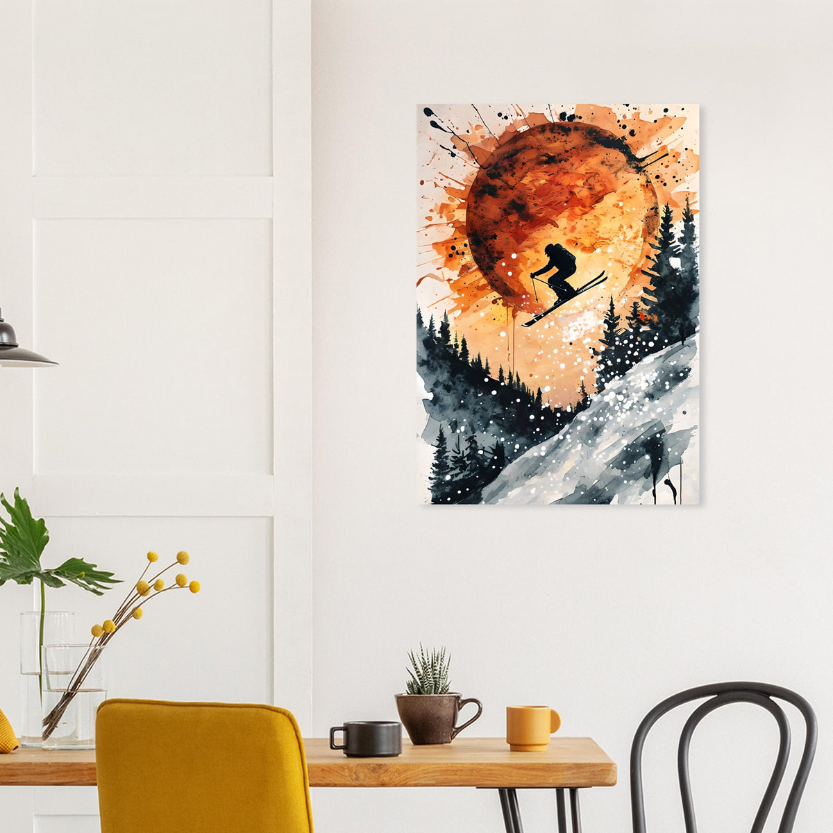 Art print of a skier against an orange sunset over mountains in a modern interior setting.