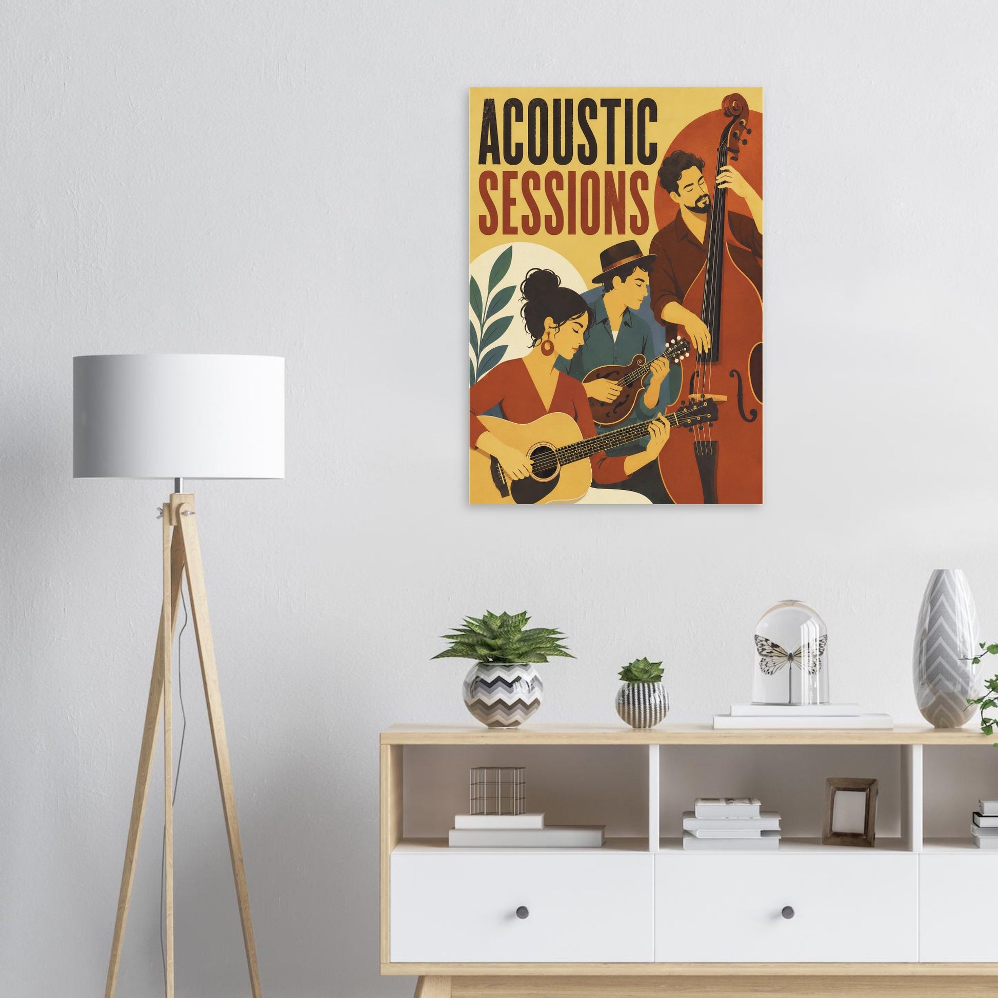 A framed wall poster with the text 'ACOUSTIC SESSIONS' hangs above a white shelf in a modern room. The poster features stylized illustrations of three musicians playing acoustic instruments, including a double bass, guitar, and mandolin, in warm yellow, orange, brown, and red tones.