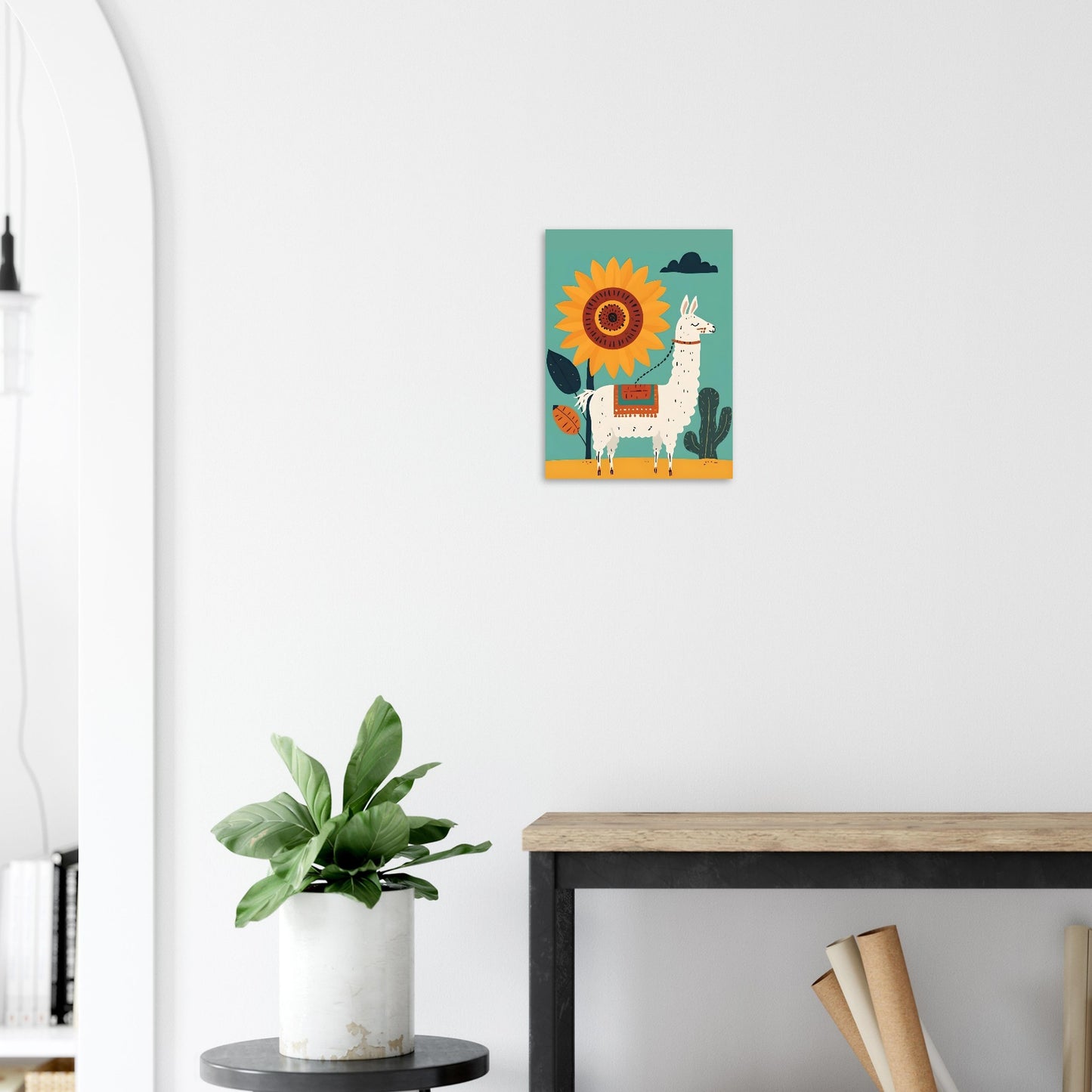 Canvas print of a llama with a sun on a white wall above a desk.