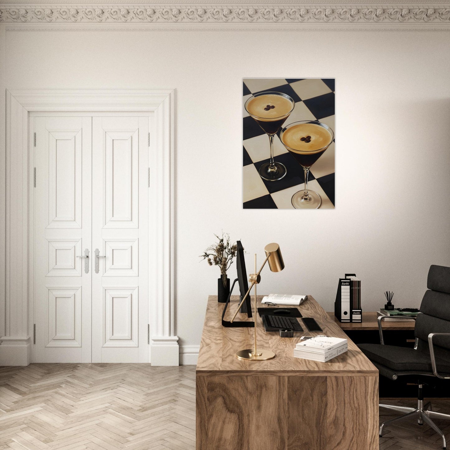Modern office interior with a desk, chair, and decorative espresso wall art.