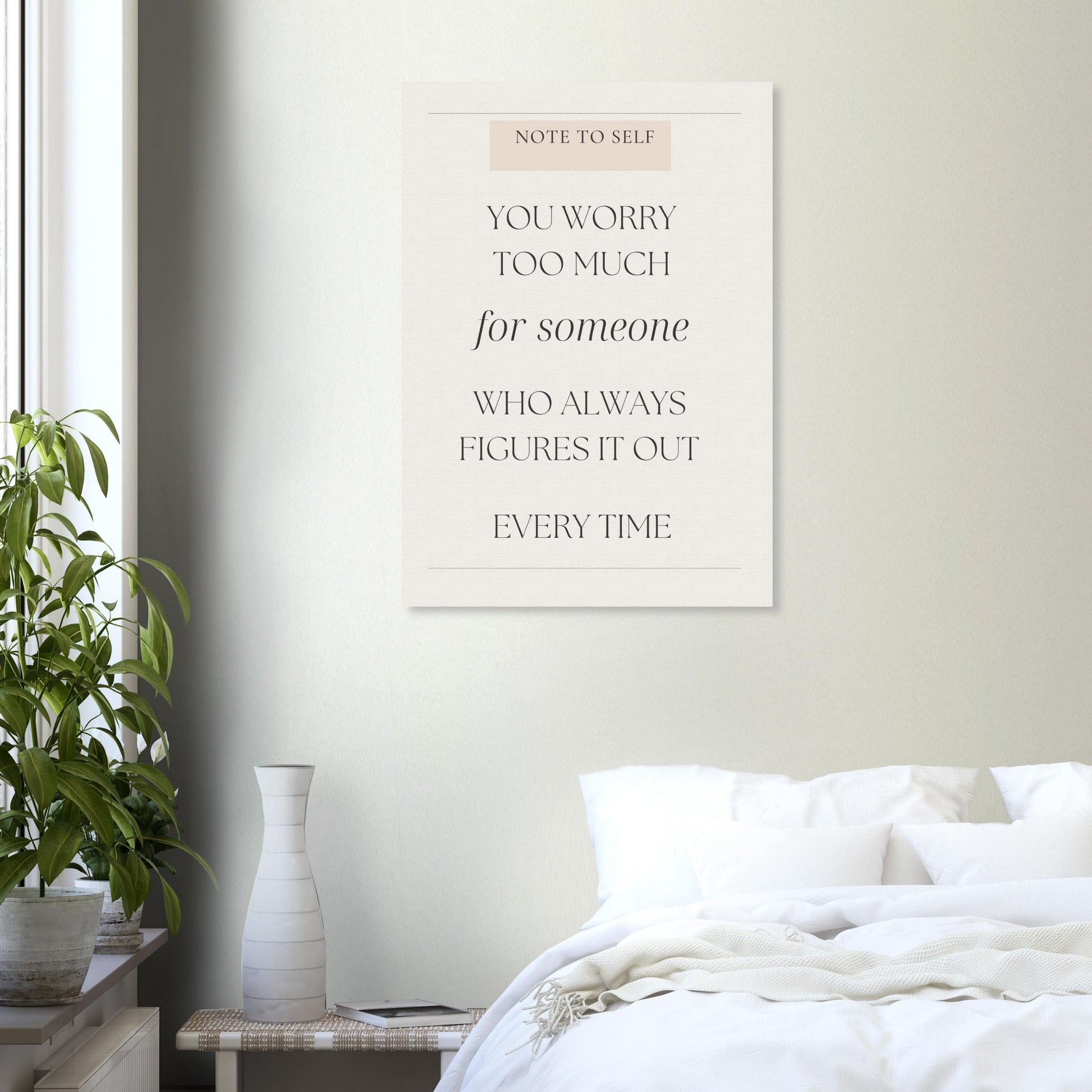 Poster with motivational quote in a bedroom setting