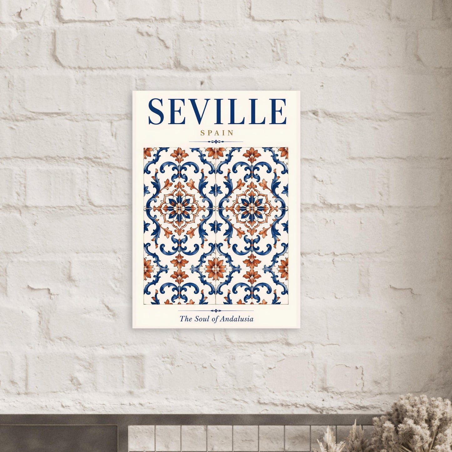 Seville Andalusian tile poster displayed against a white brick wall in a bright minimalist interior.