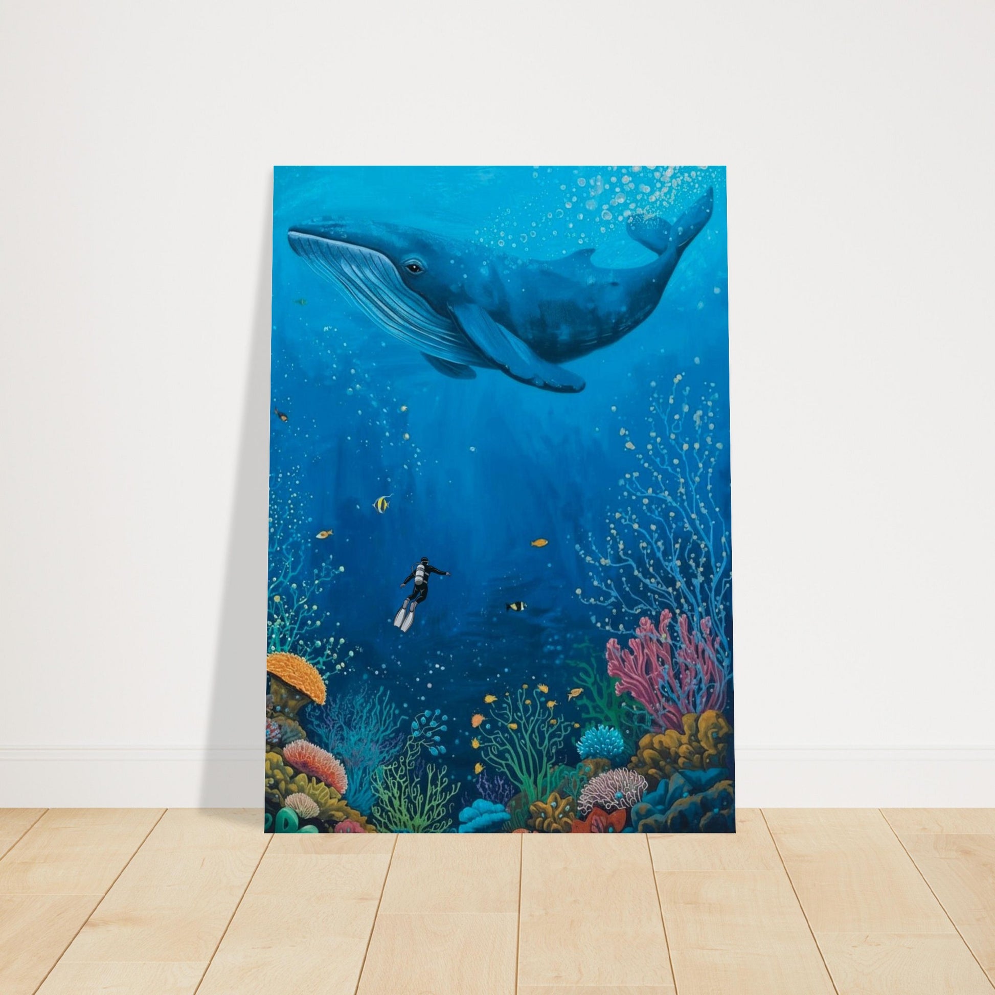 Poster of a whale and underwater scene on a white wall.
