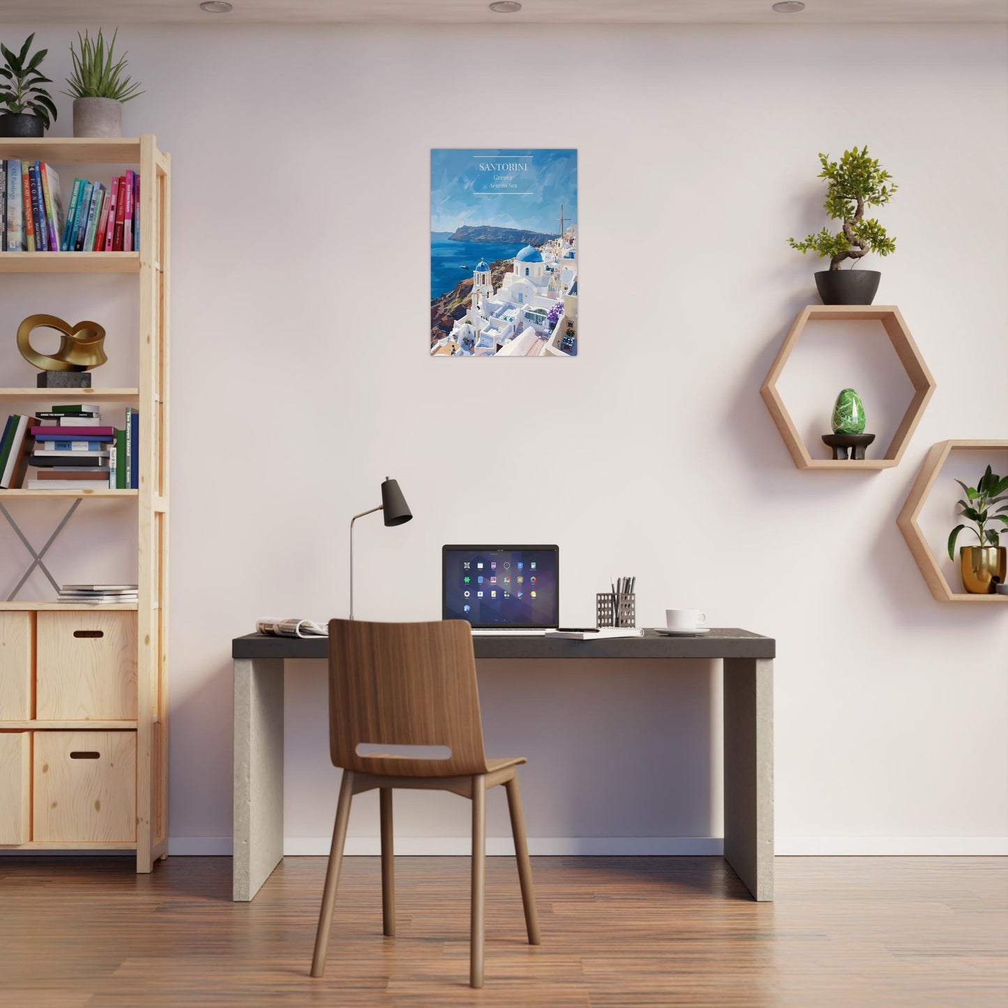 Modern home office with a desk, chair, and Santorini Greece Travel Poster displayed on a beige wall