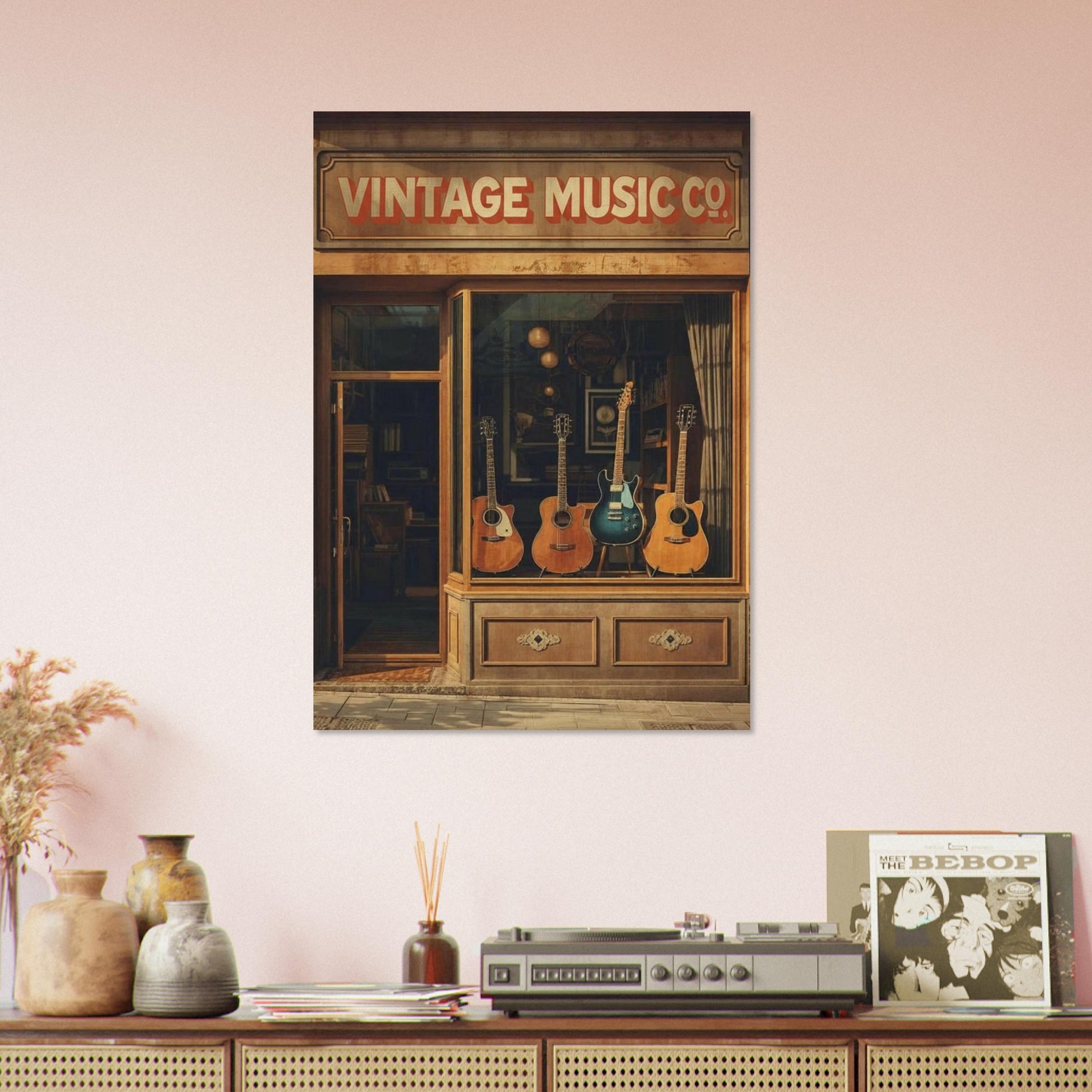 Vintage guitar storefront poster above console table with decorative accessories