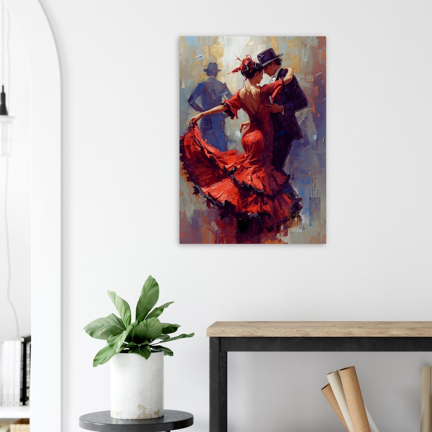 Painting of a couple dancing on a wall above a table with a plant