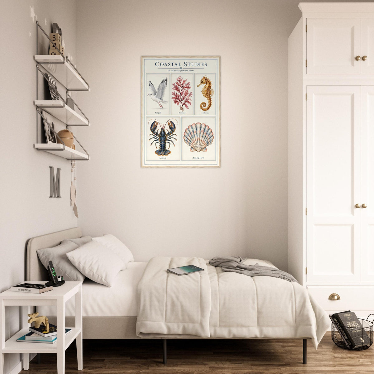 A framed vintage-style botanical and marine illustration poster reading 'Coastal Studies' hangs above a bed in a bright, modern bedroom. The poster features illustrated fish, coral, a seahorse, a lobster, and a shell.