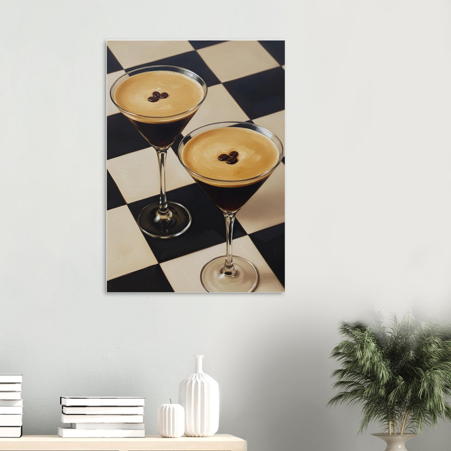 Two cocktail glasses with a checkered background on a wall above a shelf.